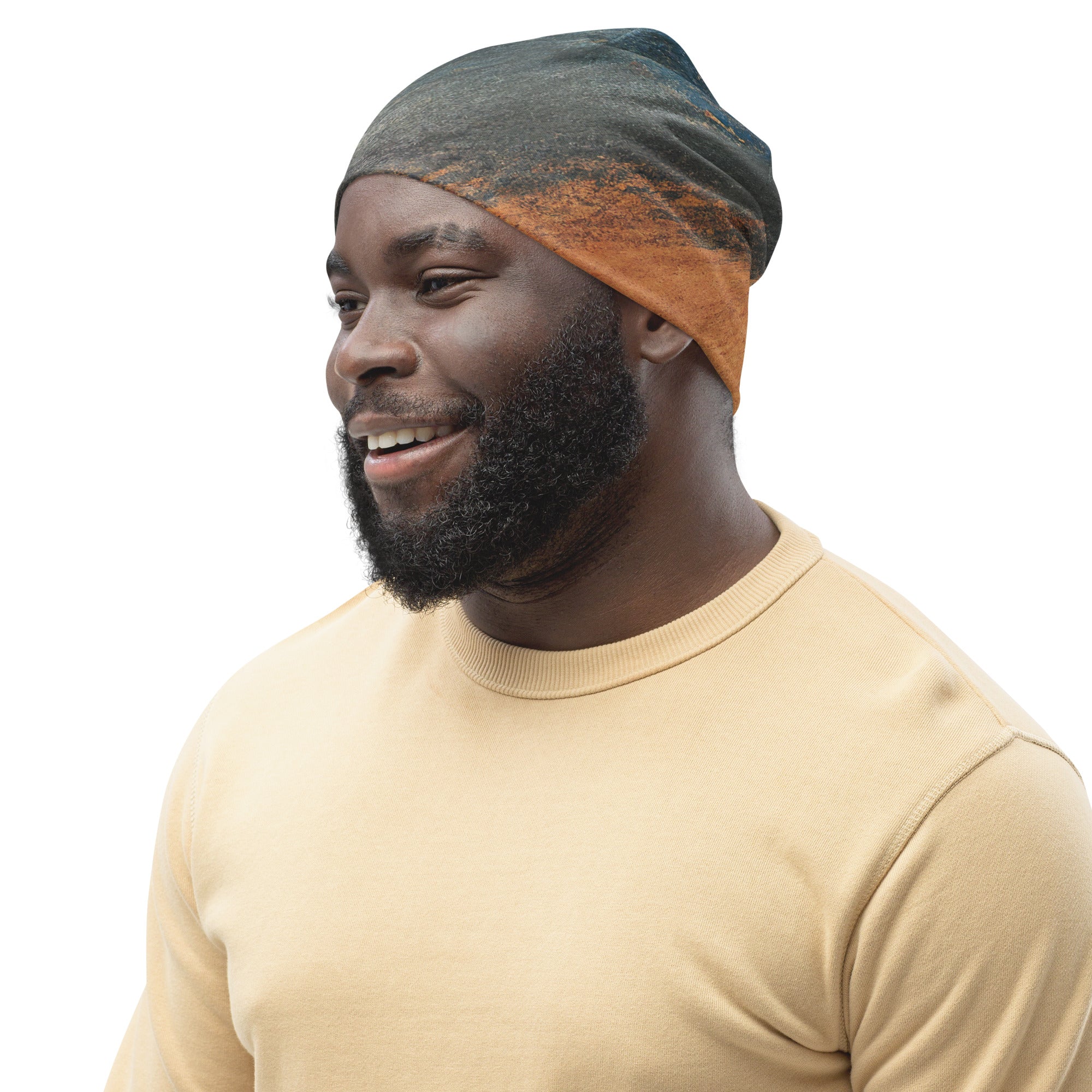 Double-layered beanie hat featuring a blue and orange abstract pattern, perfect for winter and stylish outfits.