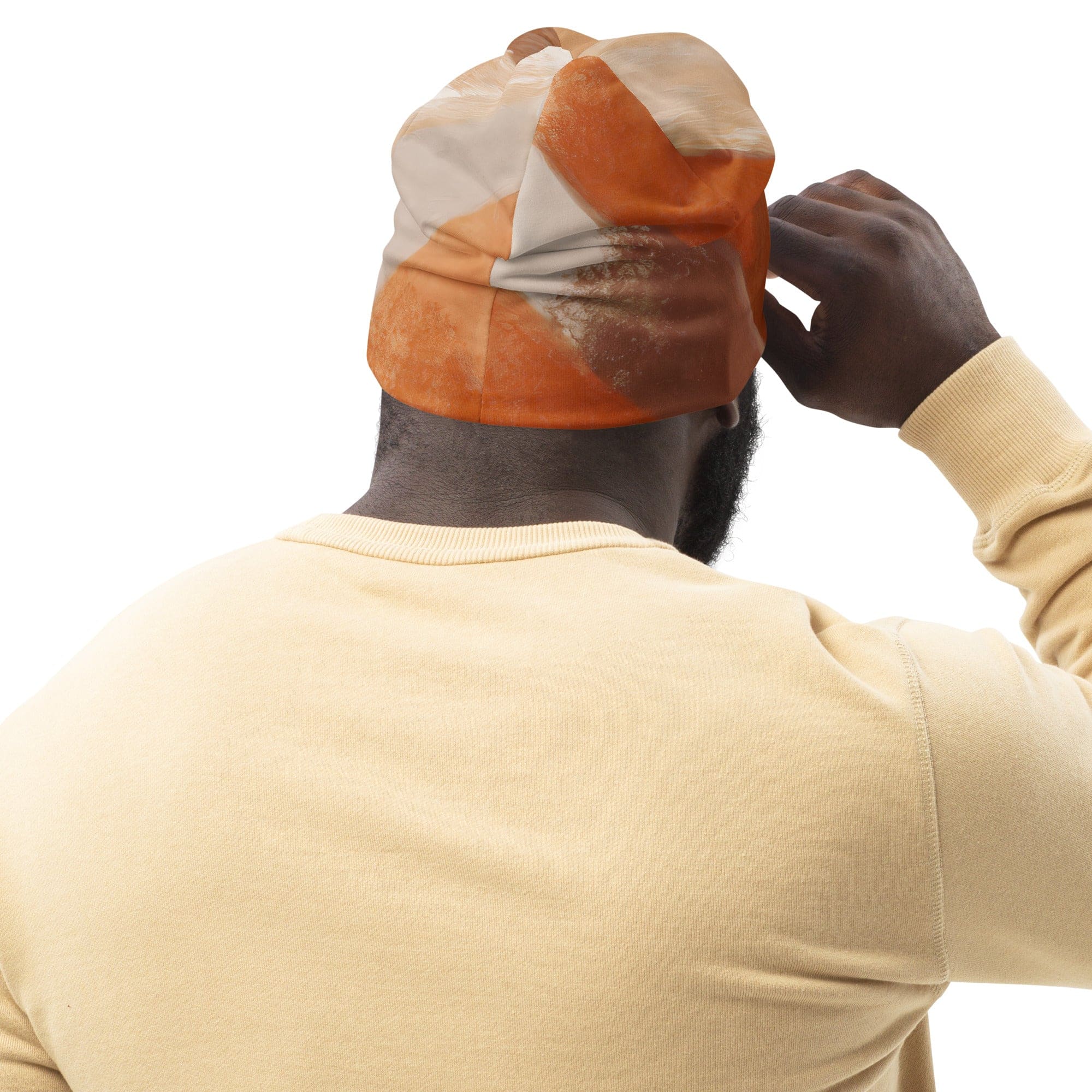 Double-layered beanie hat featuring a boho watercolor print, showcasing vibrant colors and a soft texture, perfect for winter and spring wear.