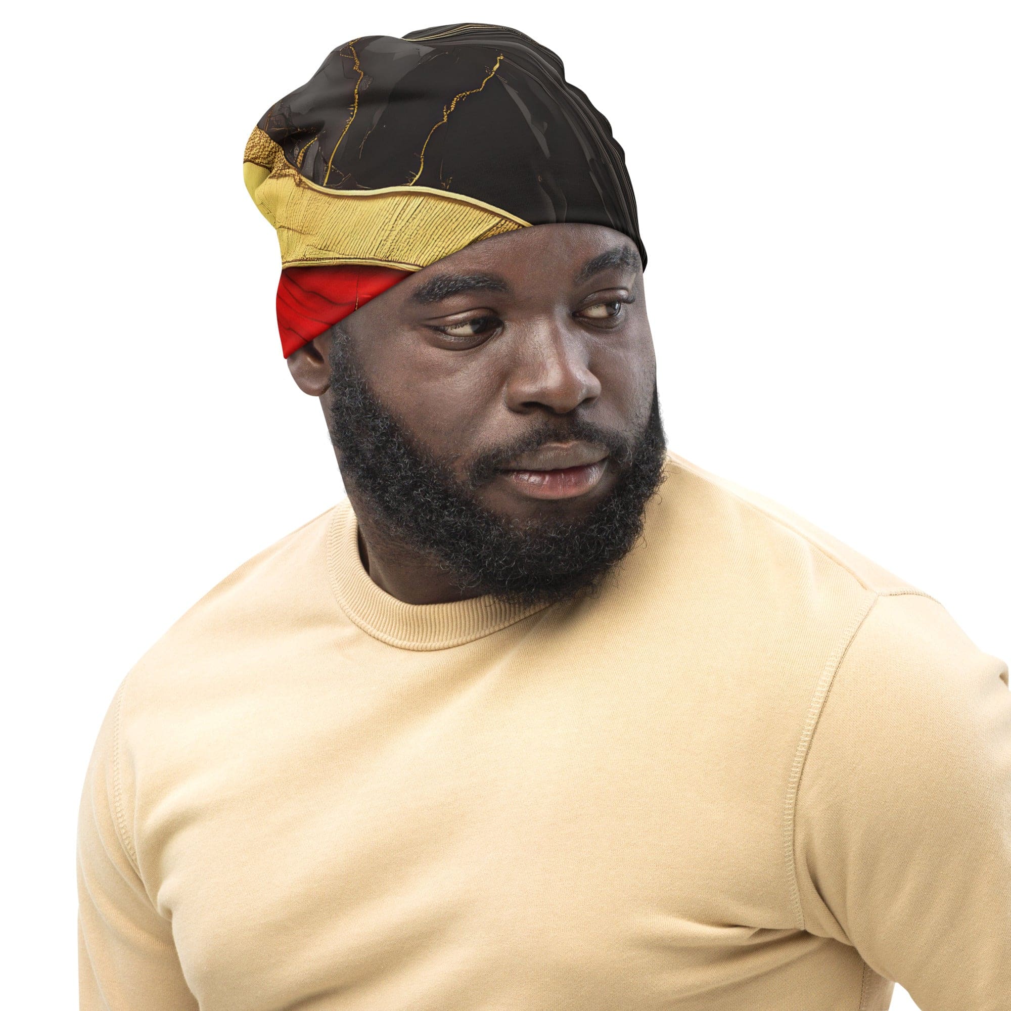 A vibrant double-layered beanie hat featuring bold red and gold tones print, perfect for winter and spring wear.