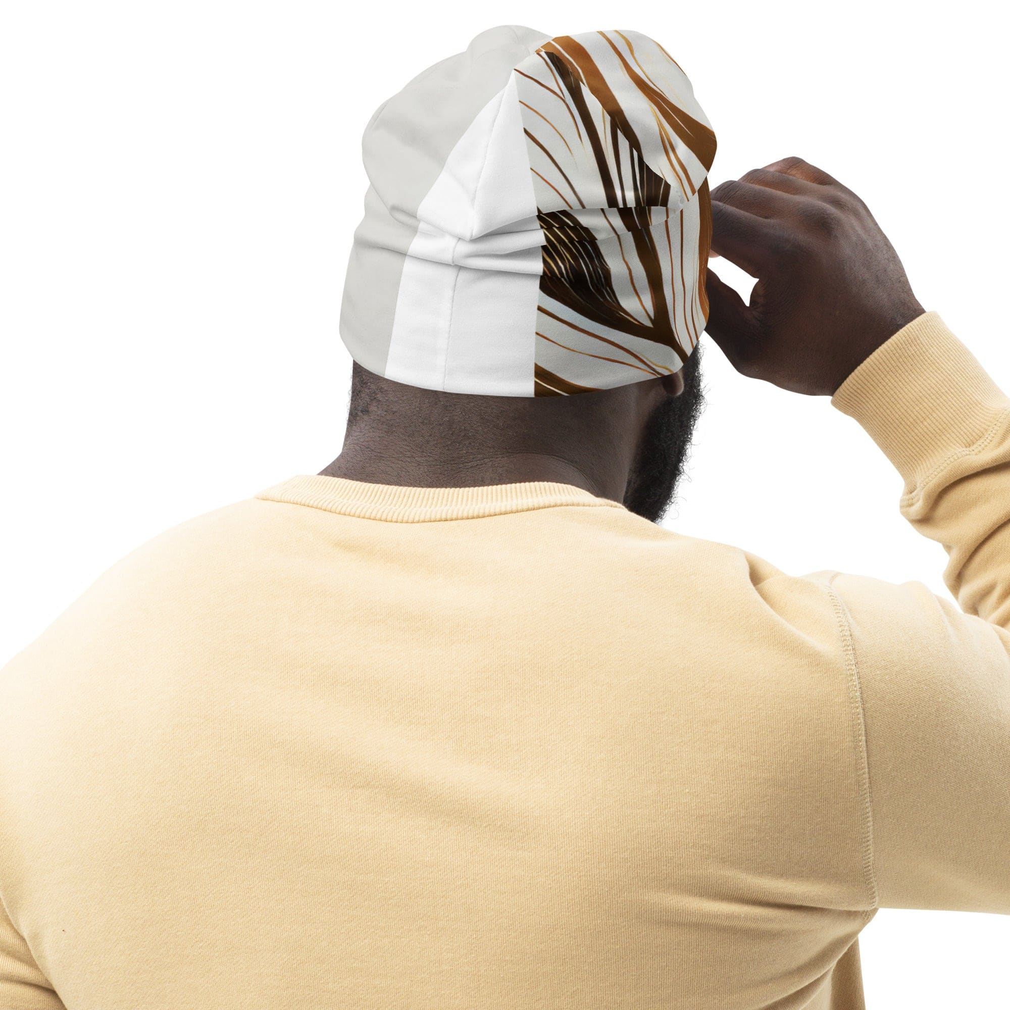 Double-layered beanie hat in brown with floral lines, showcasing a stylish and warm design for all seasons.