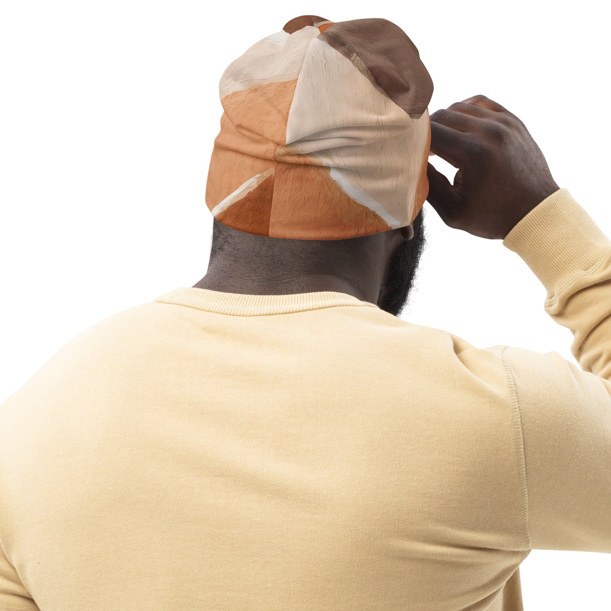 Double-layered beanie hat featuring a brown rustic watercolors print, showcasing its soft fabric and stylish design.