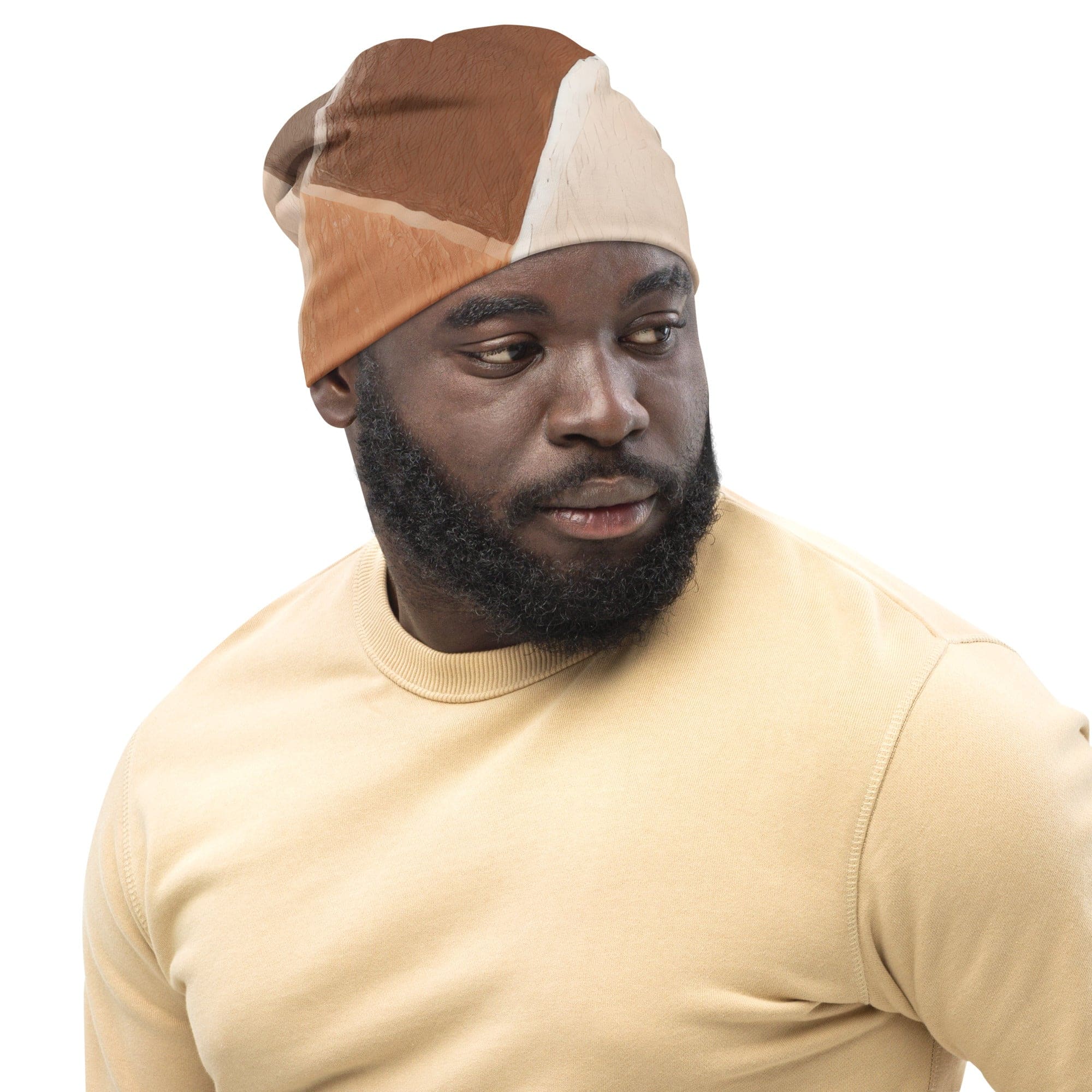 Double-layered beanie hat featuring a brown rustic watercolors print, showcasing its soft fabric and stylish design.