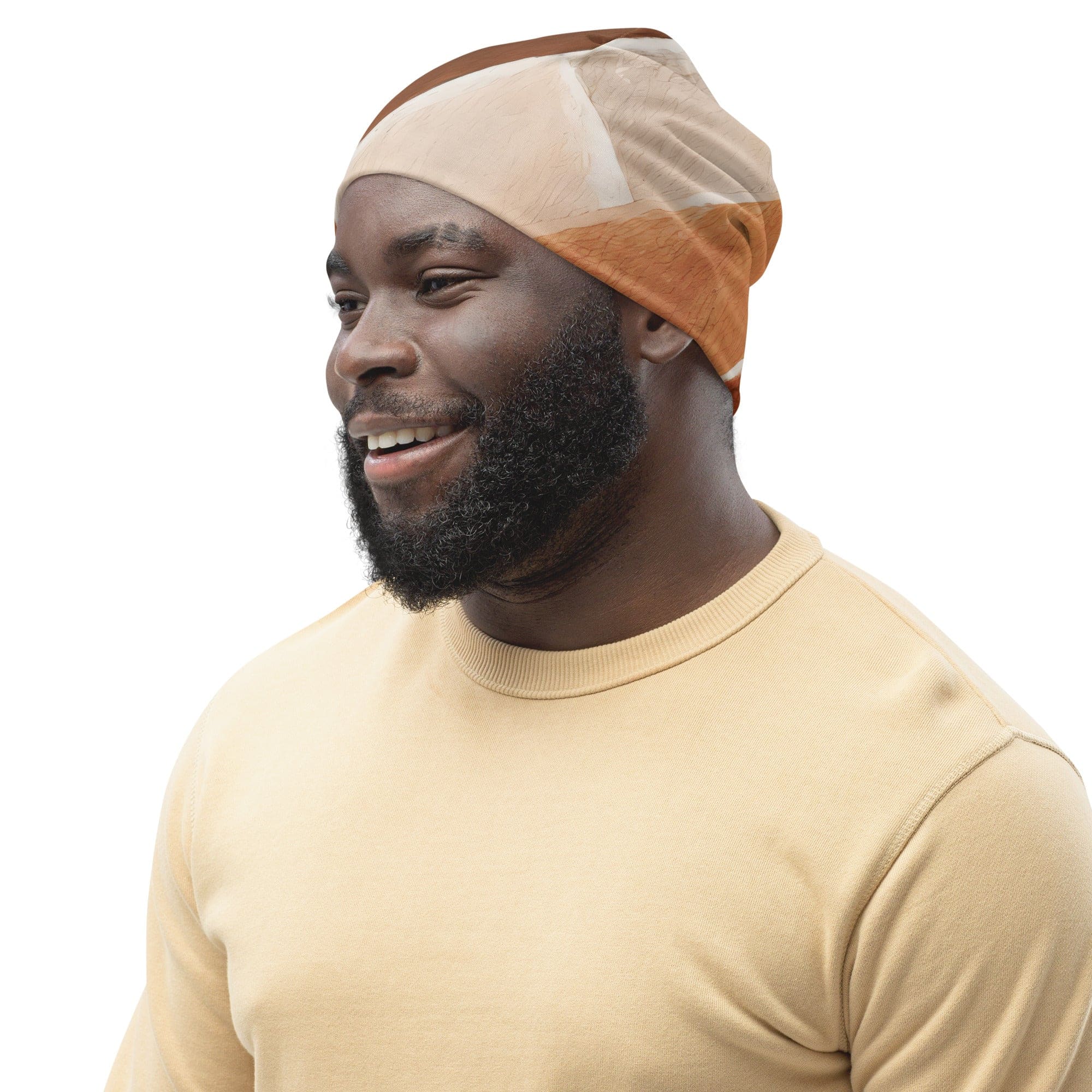 Double-layered beanie hat featuring a brown rustic watercolors print, showcasing its soft fabric and stylish design.