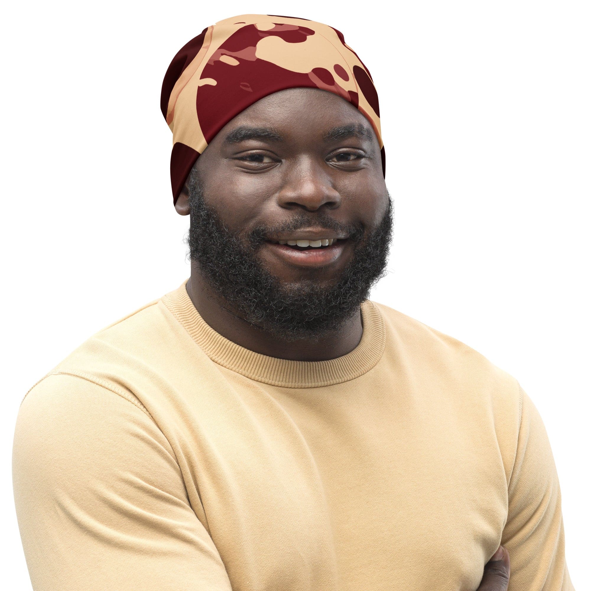 Double-layered beanie hat in burgundy and beige circular print, showcasing its soft fabric and stylish design.