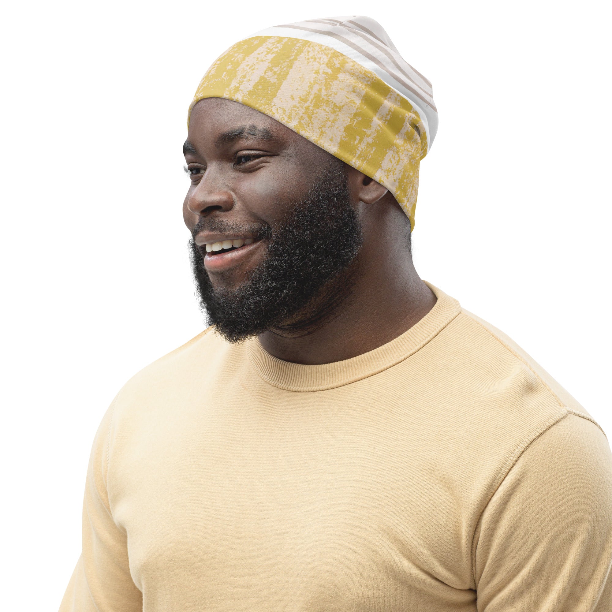 Double-layered green beanie hat with textured boho pattern, showcasing its soft fabric and stylish design.