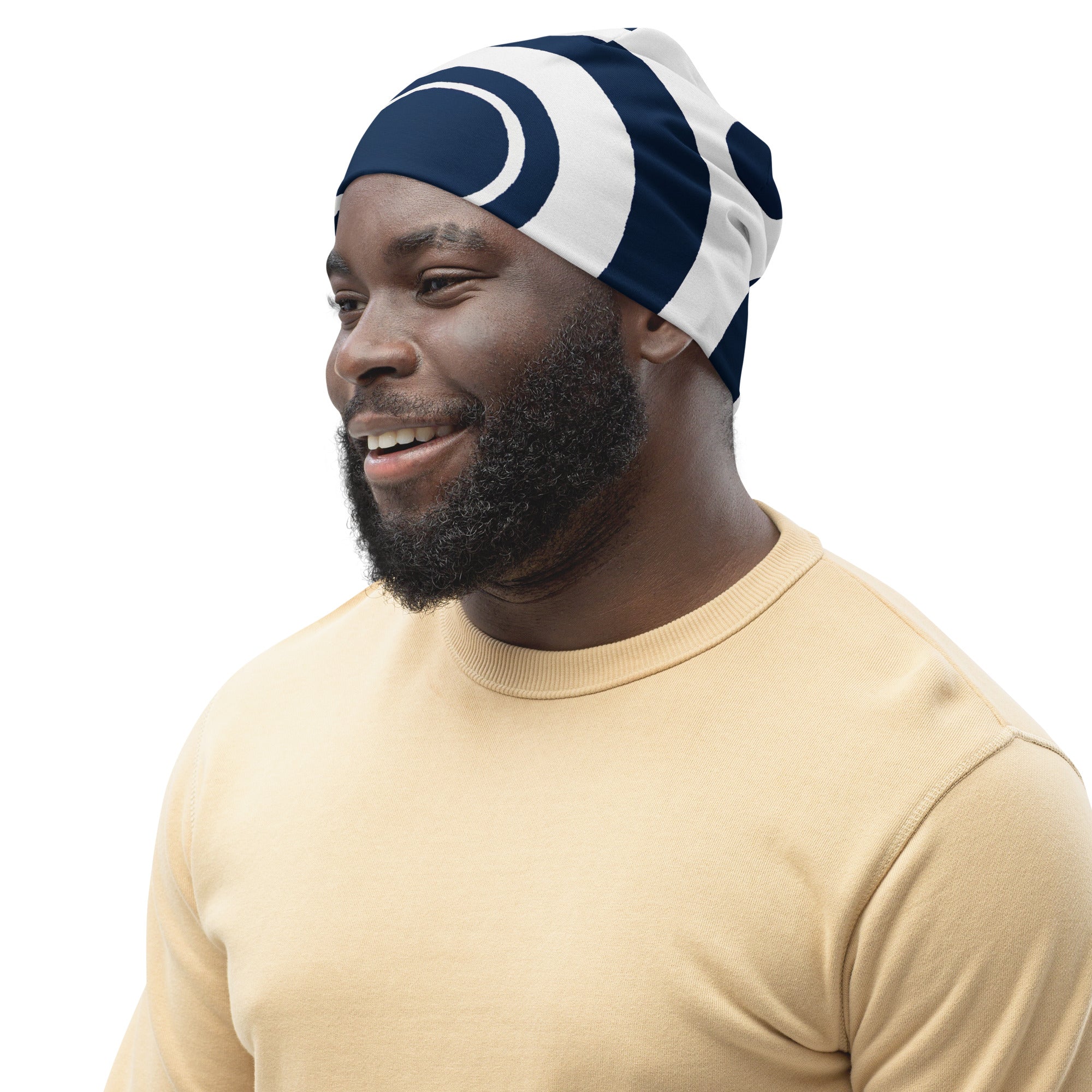 Double-layered navy blue and white beanie hat with a circular pattern, showcasing its soft fabric and stylish design.