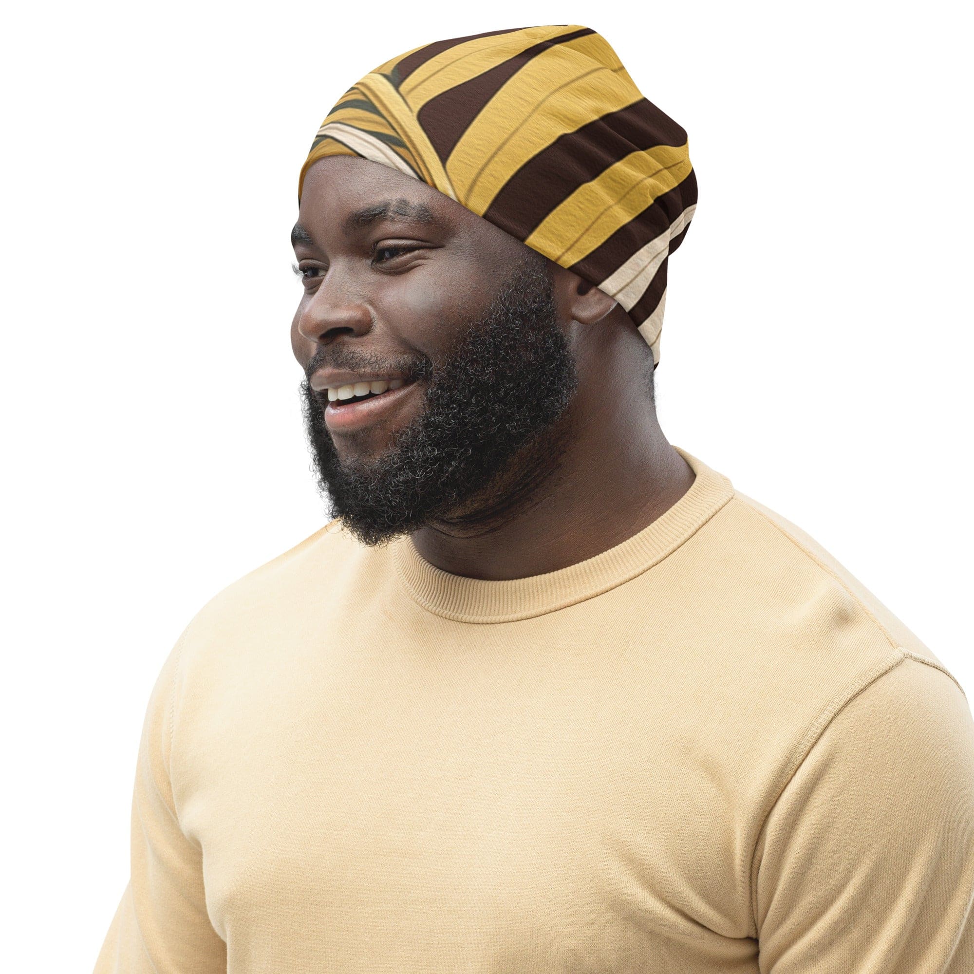 Double-layered beanie hat featuring a palm tree leaves pattern, showcasing its stylish design and soft fabric.