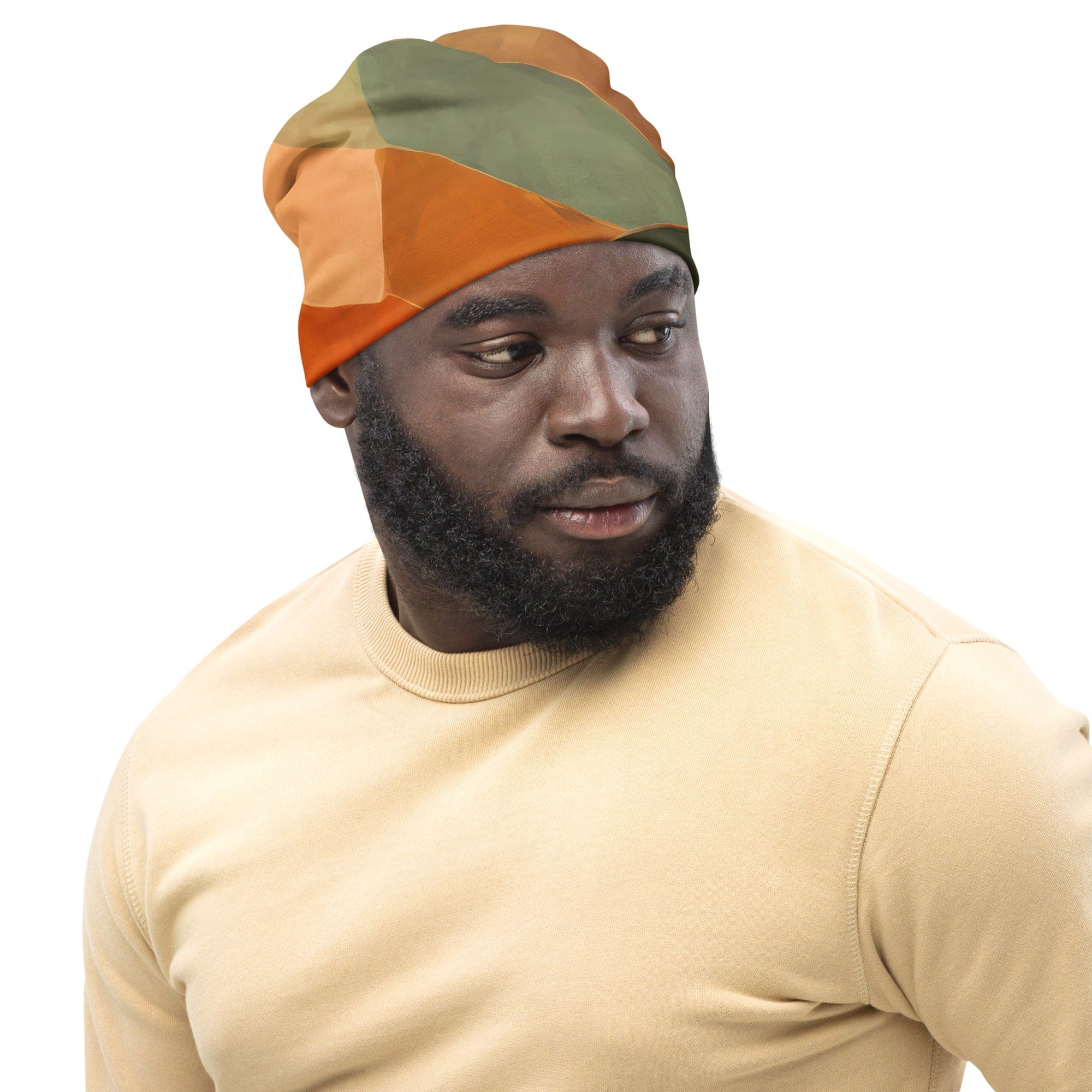 Double-layered beanie hat in rustic red with an abstract pattern, showcasing its soft fabric and stylish design.