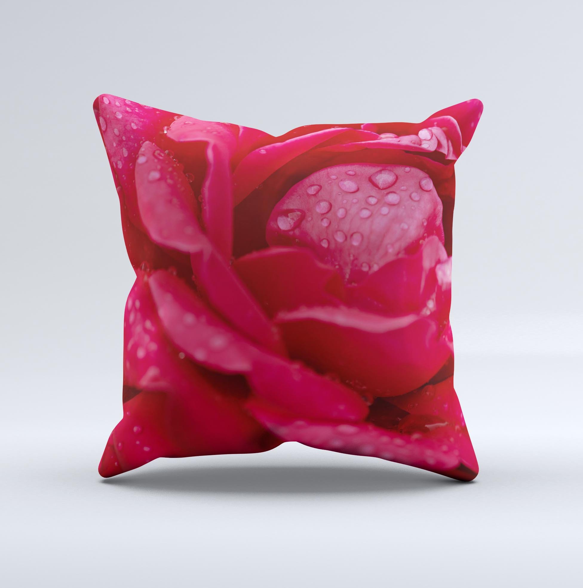 Drenched Red Rose ink-Fuzed Decorative Throw Pillow showcasing vibrant red rose design on a soft fabric.