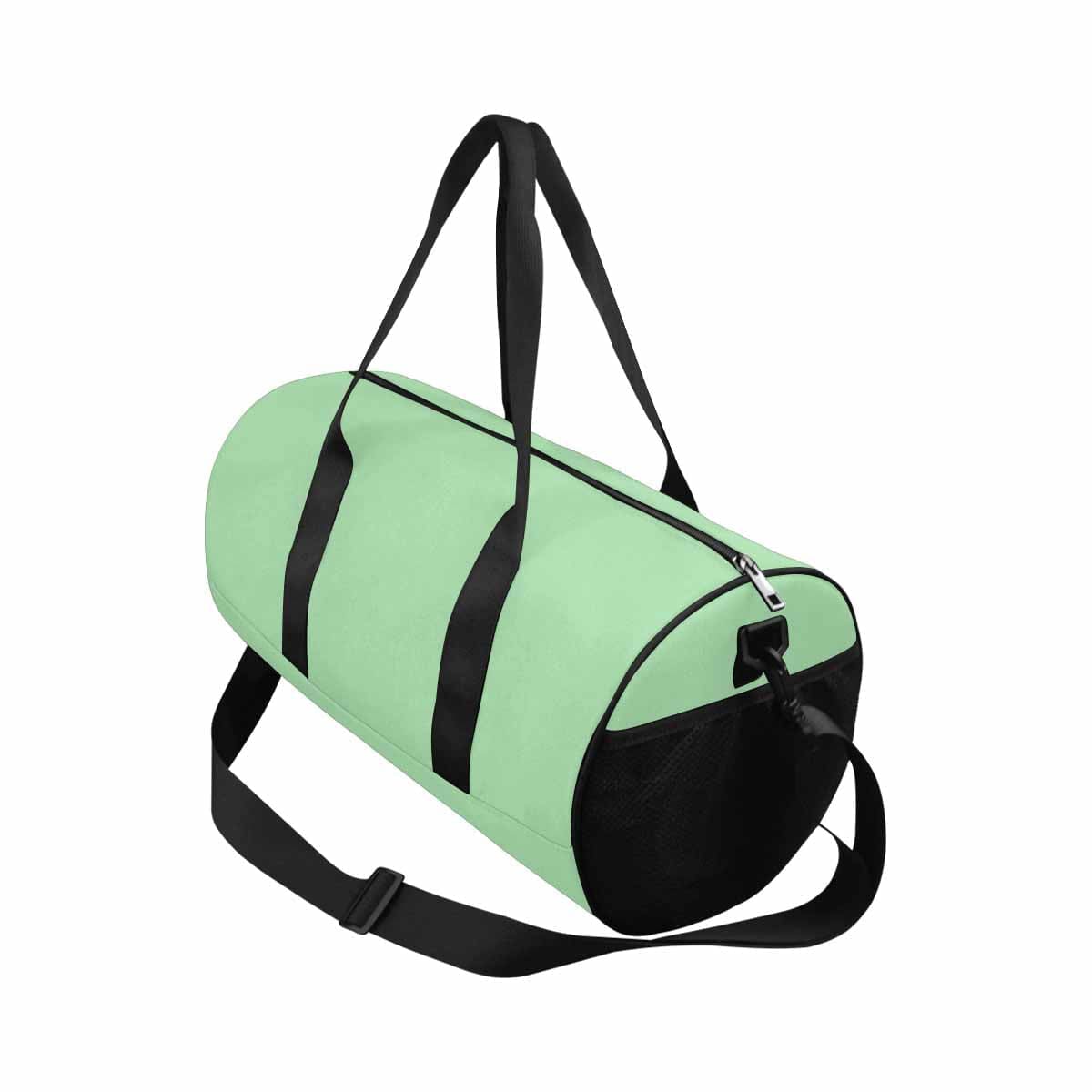 Celadon Green Duffel Bag designed for travel and outdoor activities, featuring waterproof fabric and spacious compartments.
