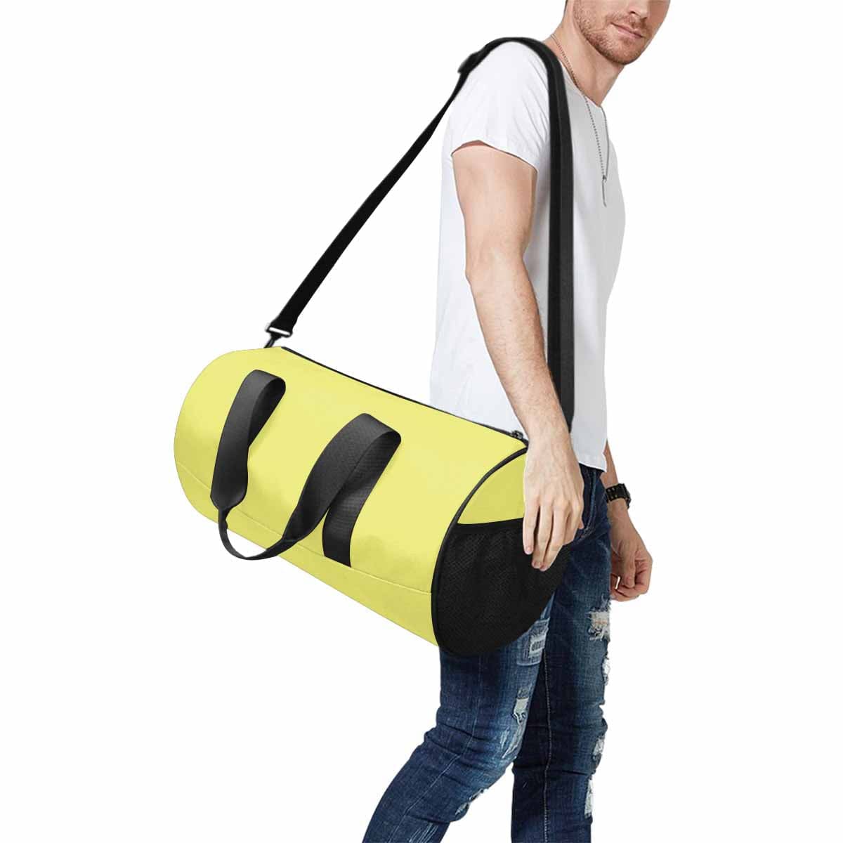 Honeysuckle Yellow Duffel Bag with waterproof fabric and spacious design, ideal for travel and outdoor activities.