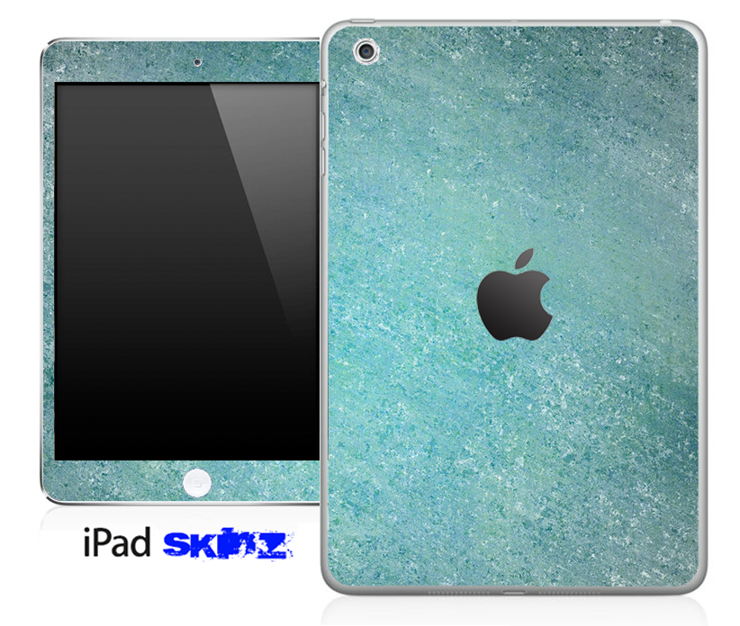 Dusty blue surface skin for iPad Mini, showcasing a sleek design with a smooth finish and precise cutouts.