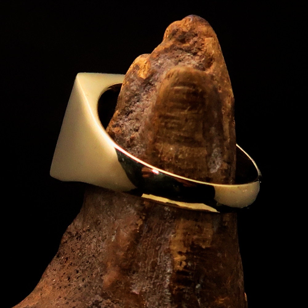 A stylish square-shaped Dutch Flag Ring made of polished brass with an enamel inlay, showcasing the vibrant colors of the Holland flag.