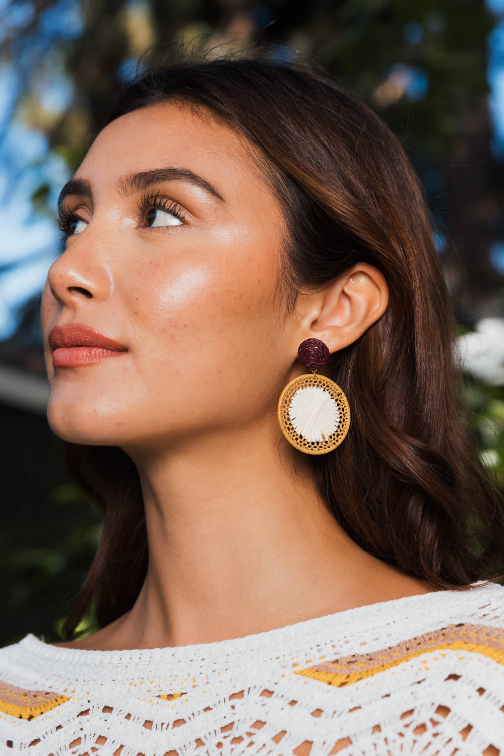 Stylish Earthy Chic Raffia Dangle Earrings featuring eco-friendly raffia and elegant dangle design in earth-inspired colors.