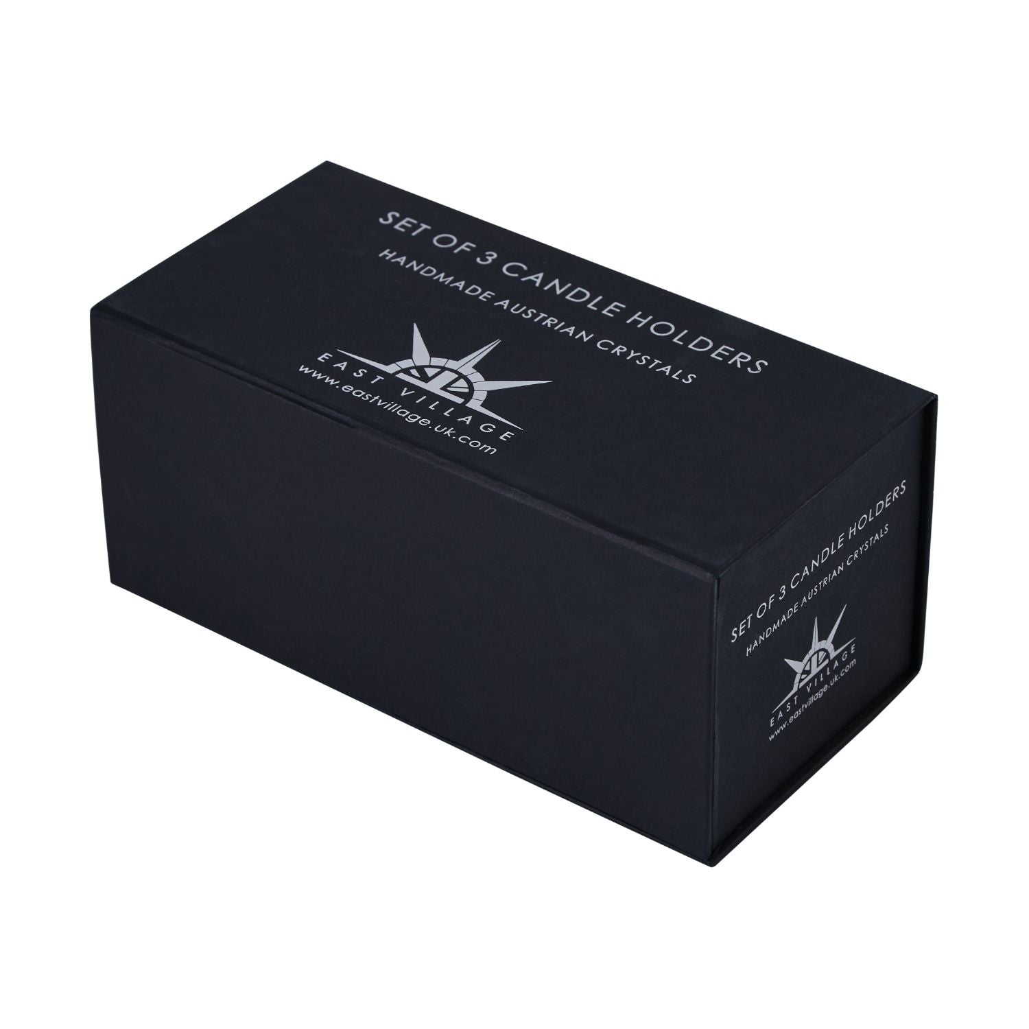 A set of three handmade Austrian crystal tumbler candle holders on a faux leather edged glass mirror tray, reflecting light beautifully.