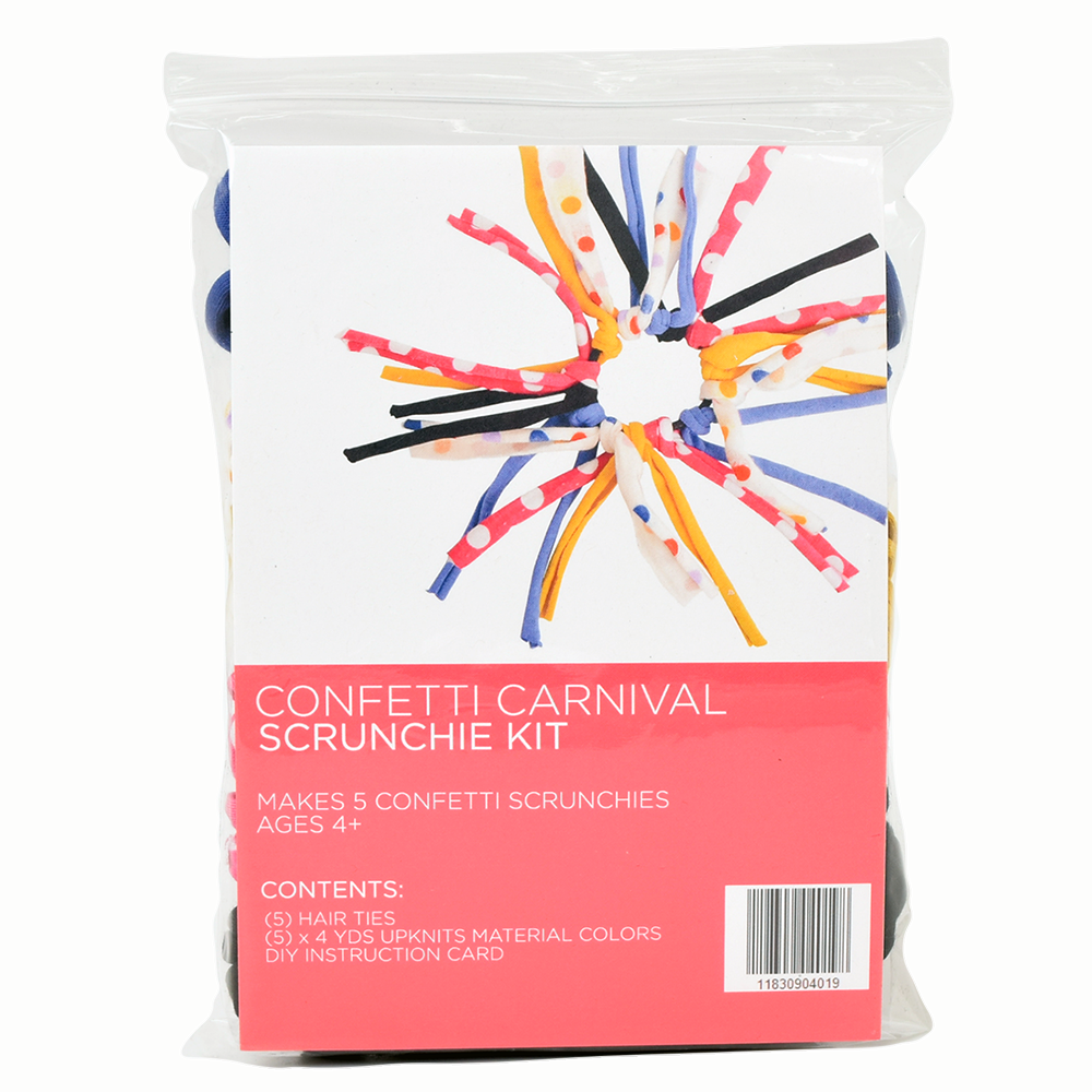 Eco DIY Scrunchie Kit featuring colorful upcycled materials and hair ties for crafting stylish scrunchies.