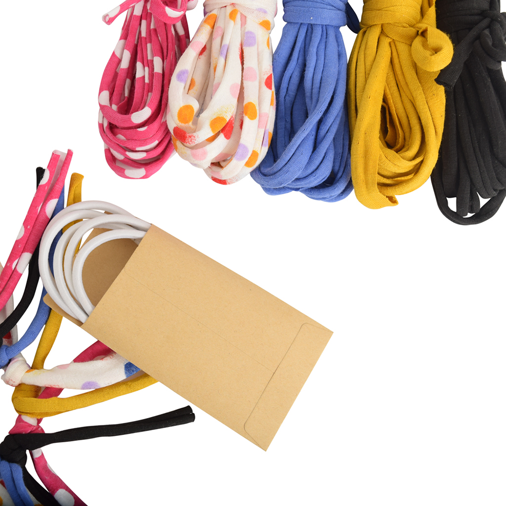 Eco DIY Scrunchie Kit featuring colorful upcycled materials and hair ties for crafting stylish scrunchies.