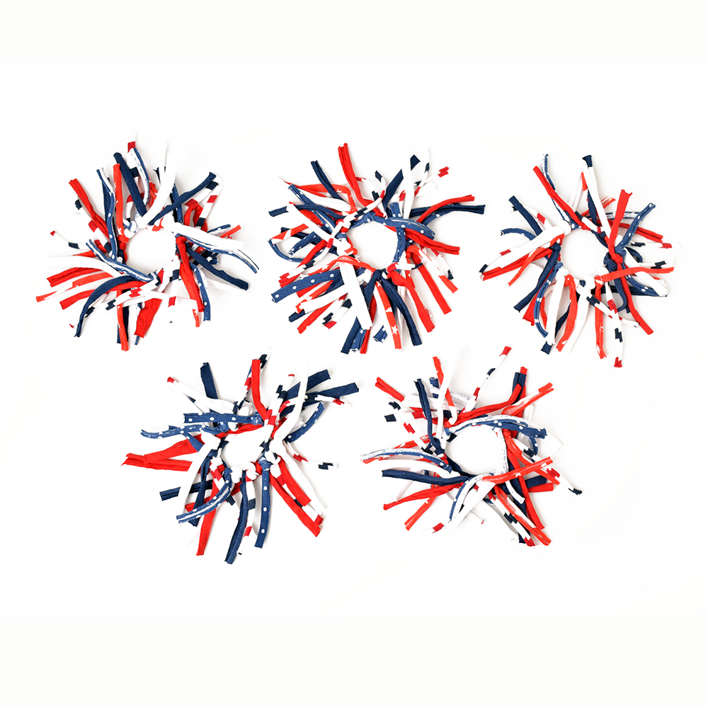 Eco DIY Scrunchie Kit featuring colorful upcycled materials and hair ties for crafting stylish scrunchies.