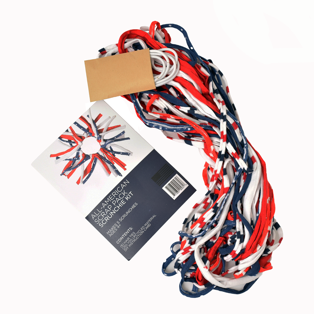 Eco DIY Scrunchie Kit featuring colorful upcycled materials and hair ties for crafting stylish scrunchies.