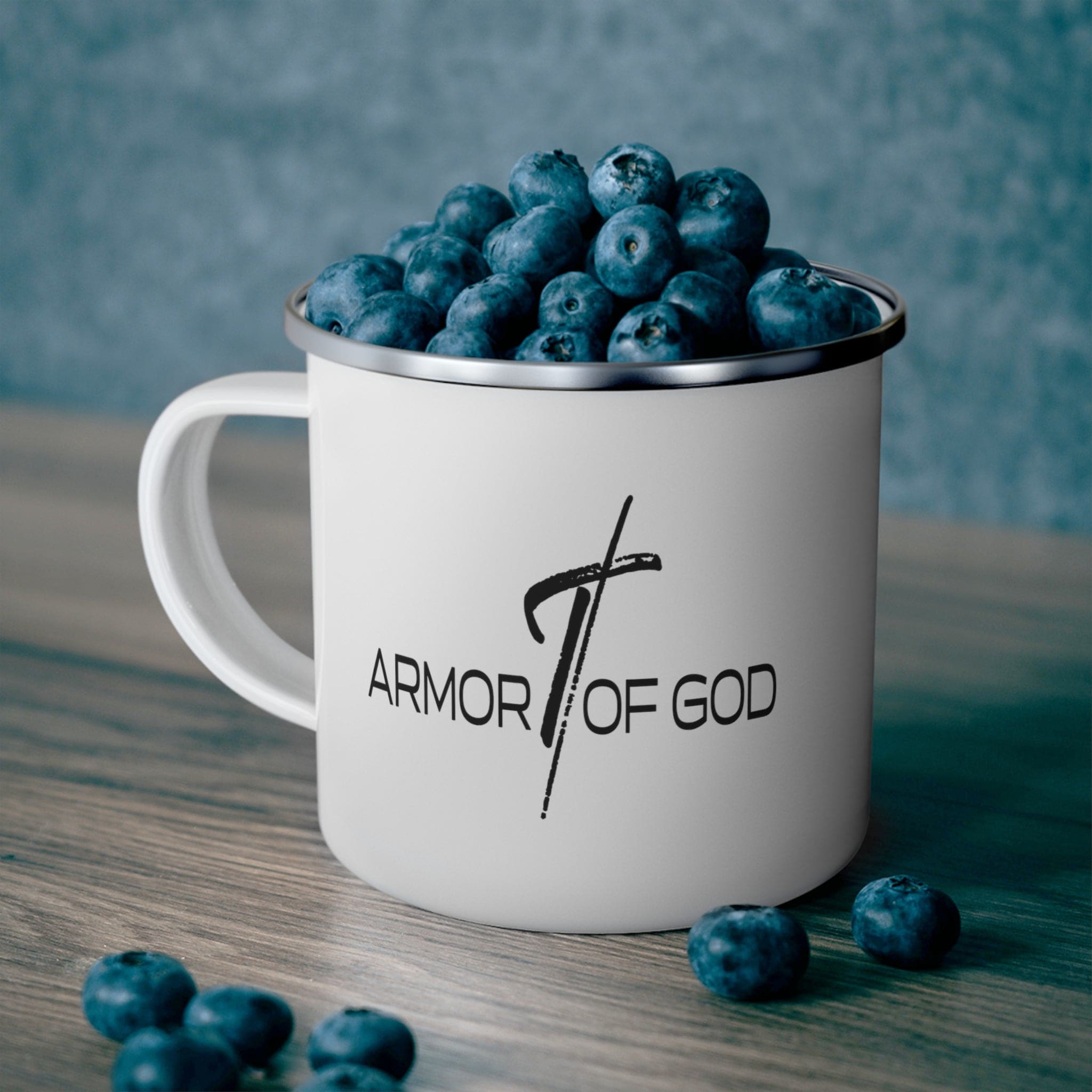 Durable enamel camping mug featuring the Armor of God black illustration, perfect for outdoor and indoor use.