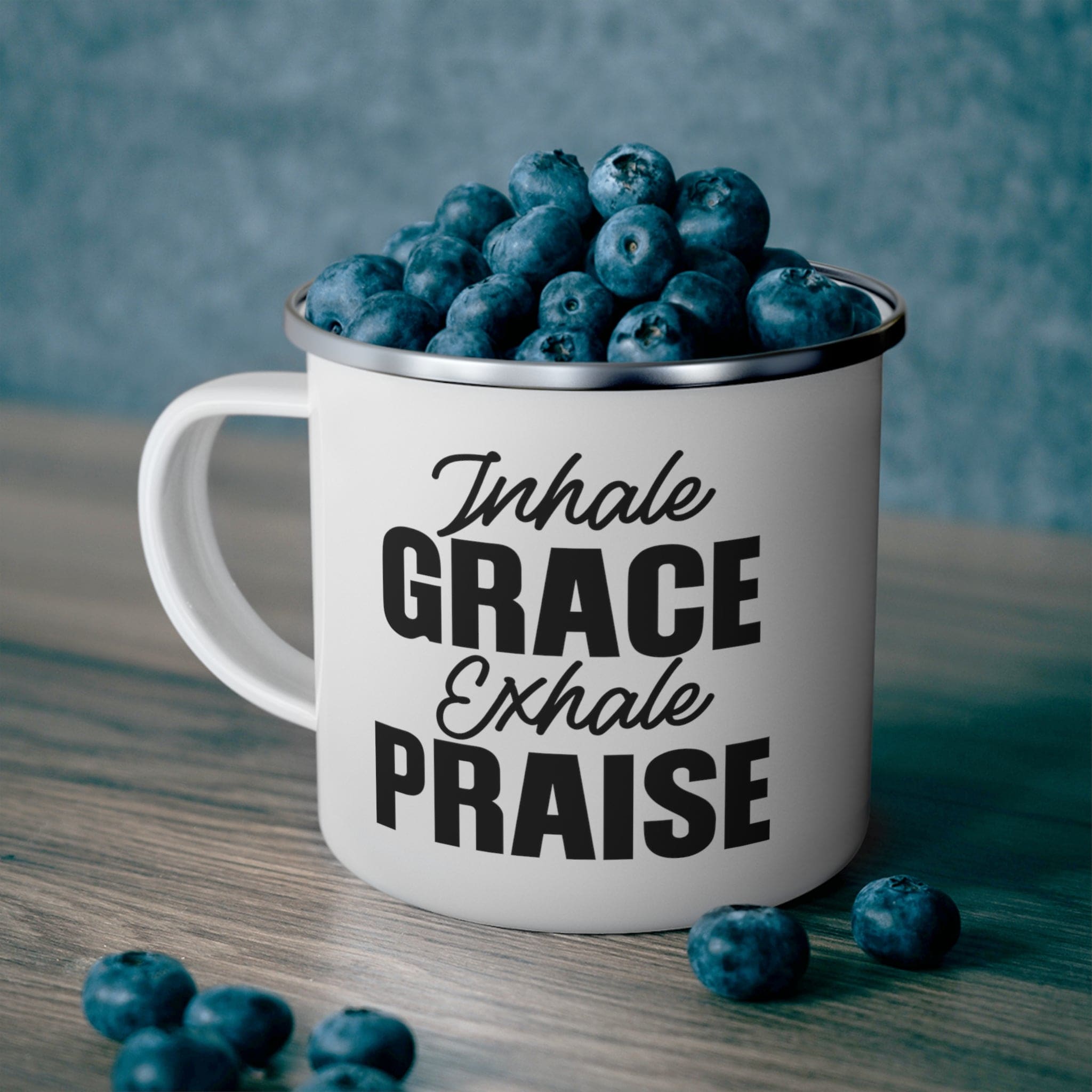 Durable enamel camping mug featuring a black illustration with the phrase 'Inhale Grace Exhale Praise', perfect for outdoor and indoor use.