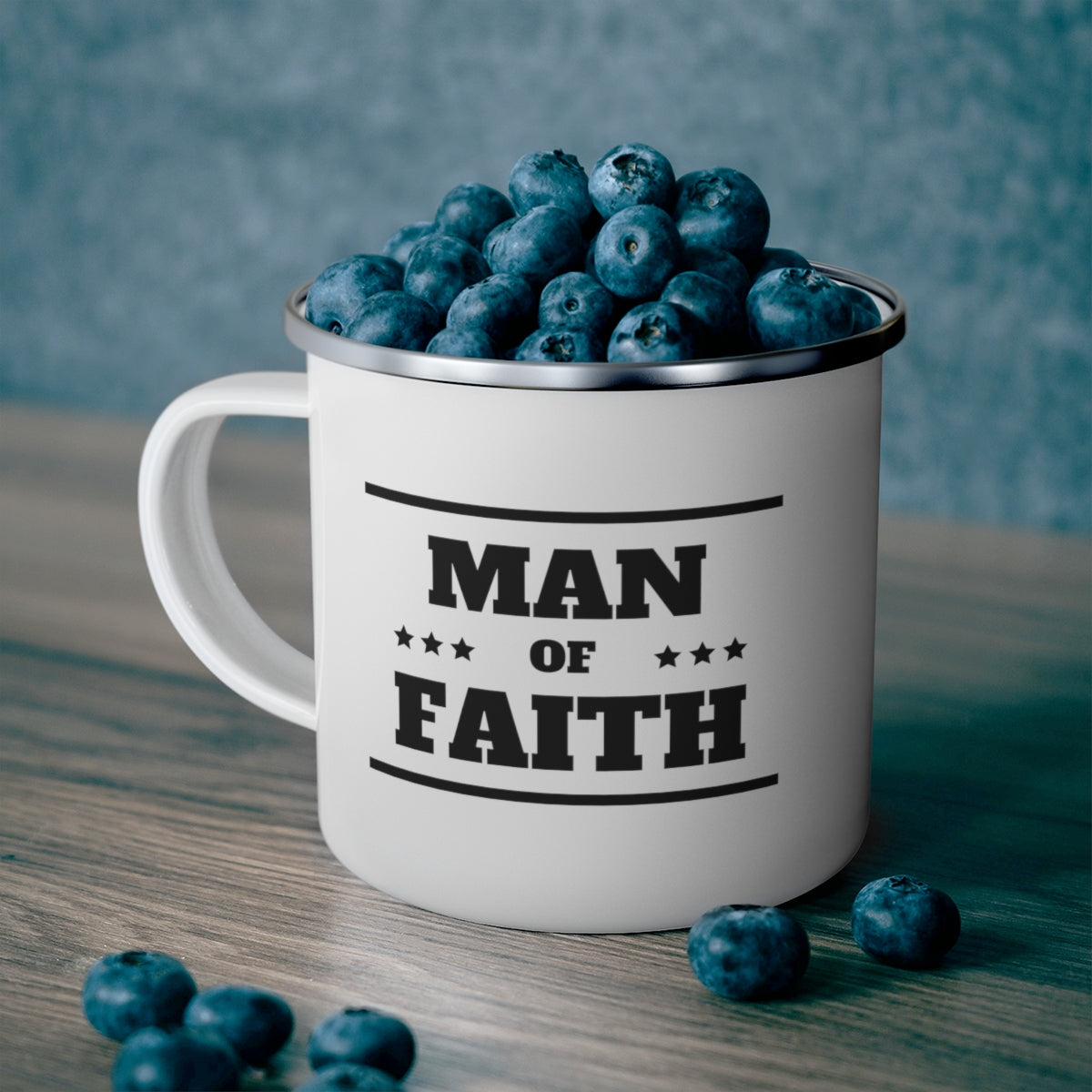 Enamel camping mug featuring a black illustration of a man of faith, perfect for outdoor and indoor use.