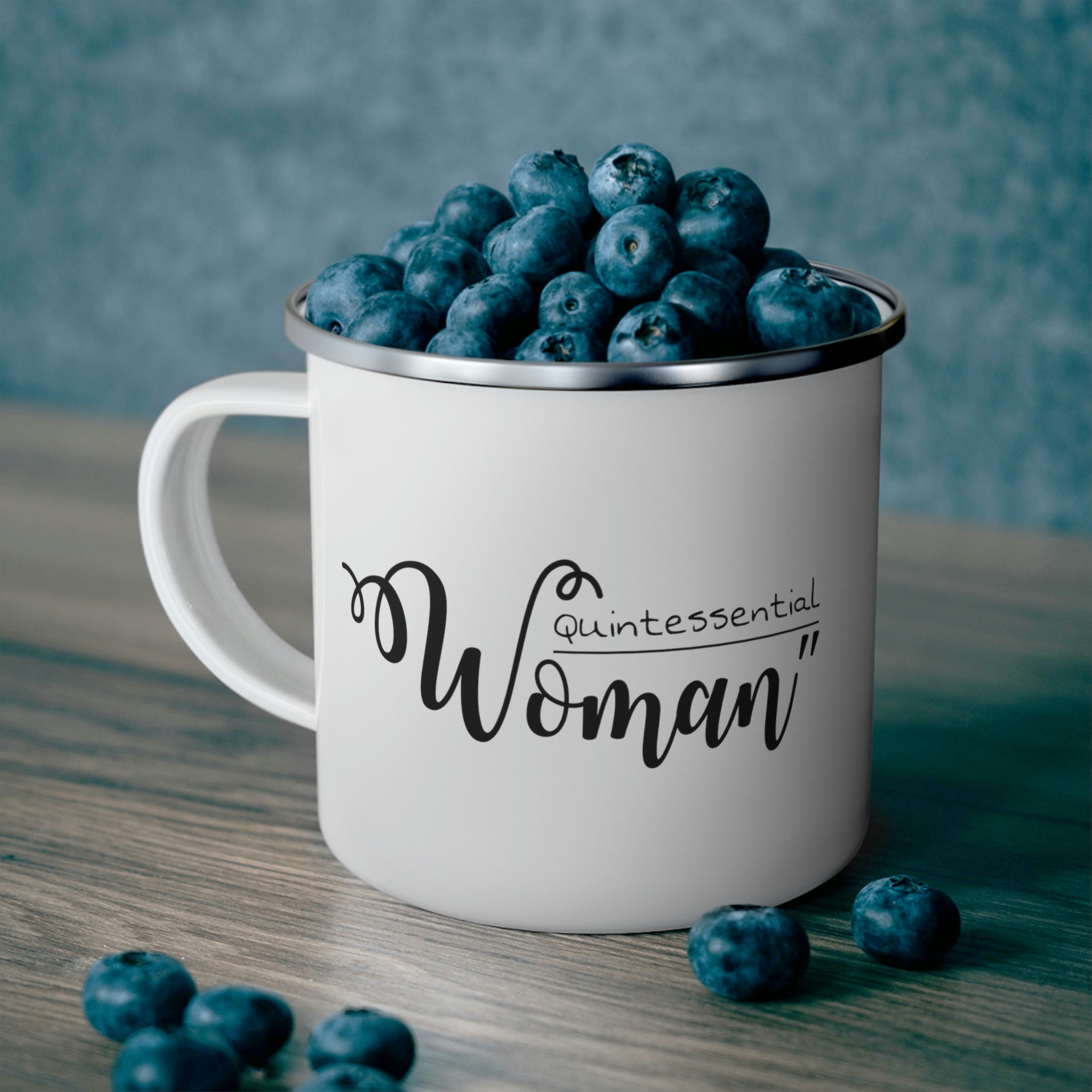 Durable enamel camping mug featuring a stylish black illustration of a quintessential woman, perfect for coffee and outdoor activities.