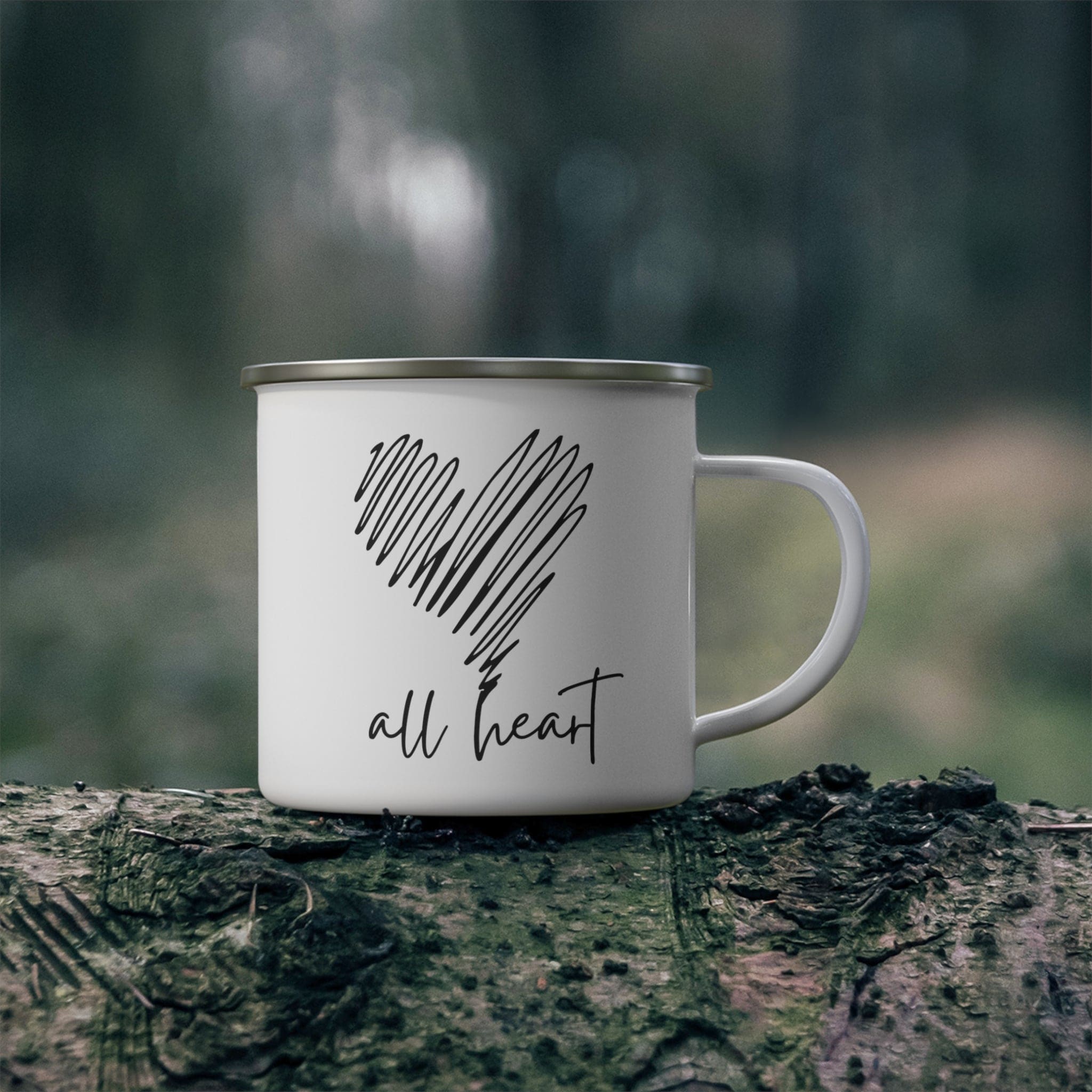 Durable enamel camping mug with black line art print, perfect for coffee and outdoor activities.