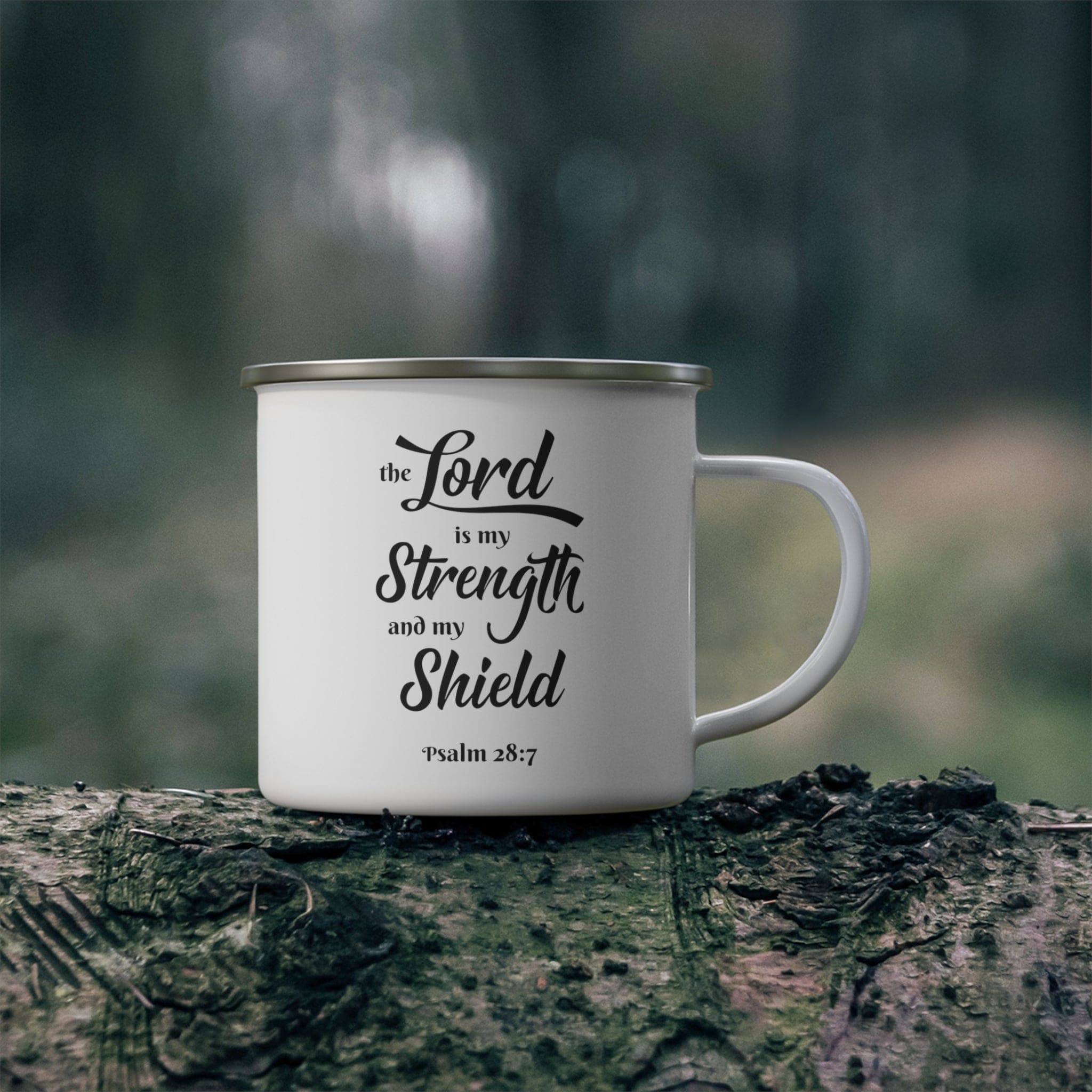 Enamel camping mug with black print saying 'The Lord is my Strength and my Shield', showcasing its durable design and C-handle.