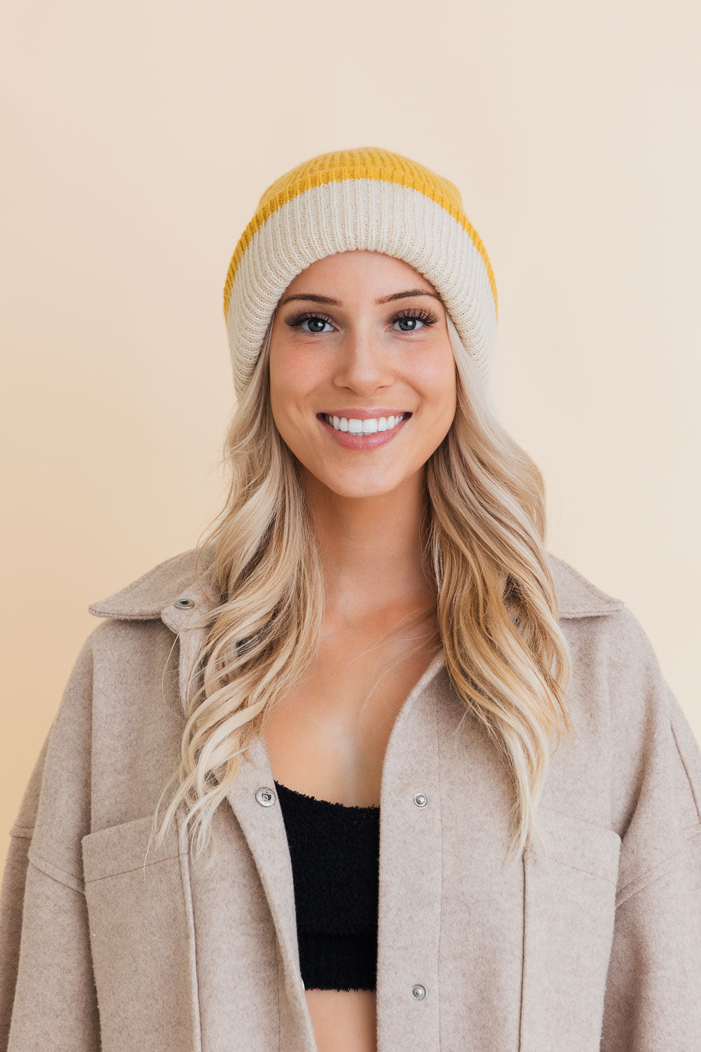 Essential Harmony Two-Tone Knit Beanie showcasing its stylish two-tone design and quality knit material.