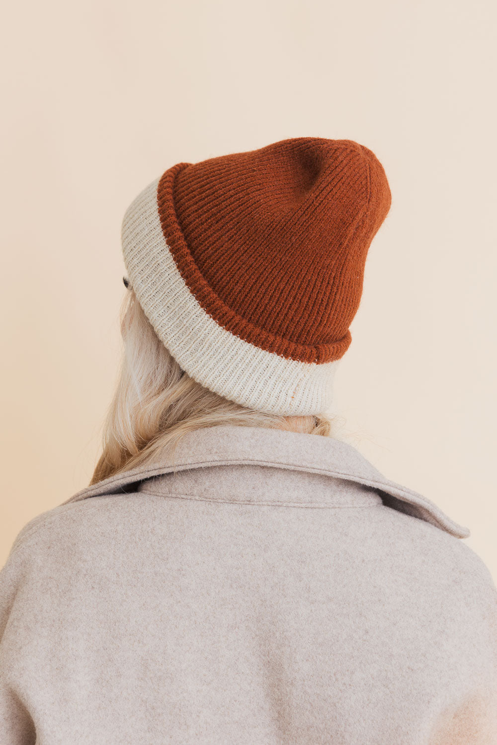 Essential Harmony Two-Tone Knit Beanie showcasing its stylish two-tone design and quality knit material.