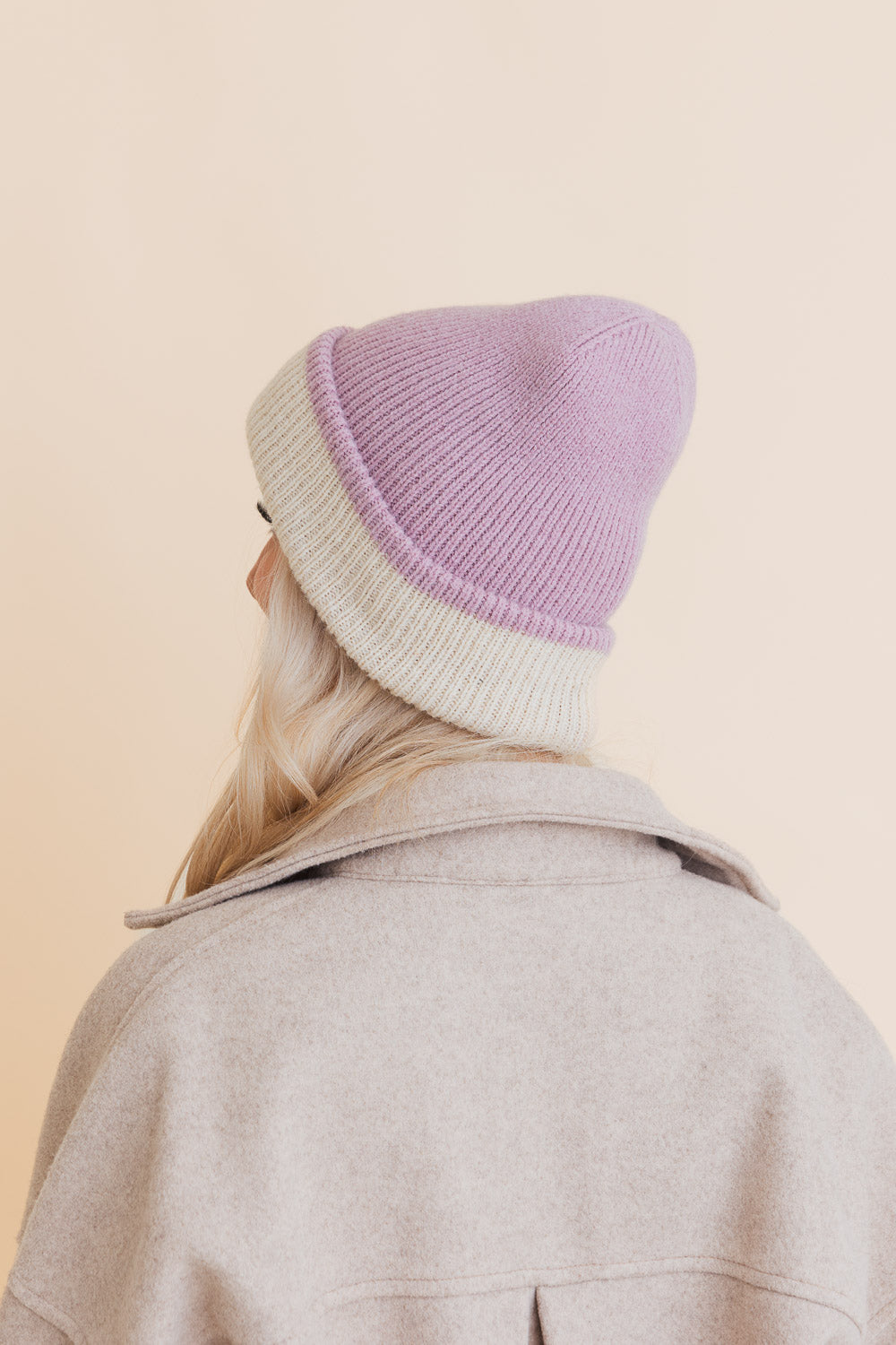 Essential Harmony Two-Tone Knit Beanie showcasing its stylish two-tone design and quality knit material.