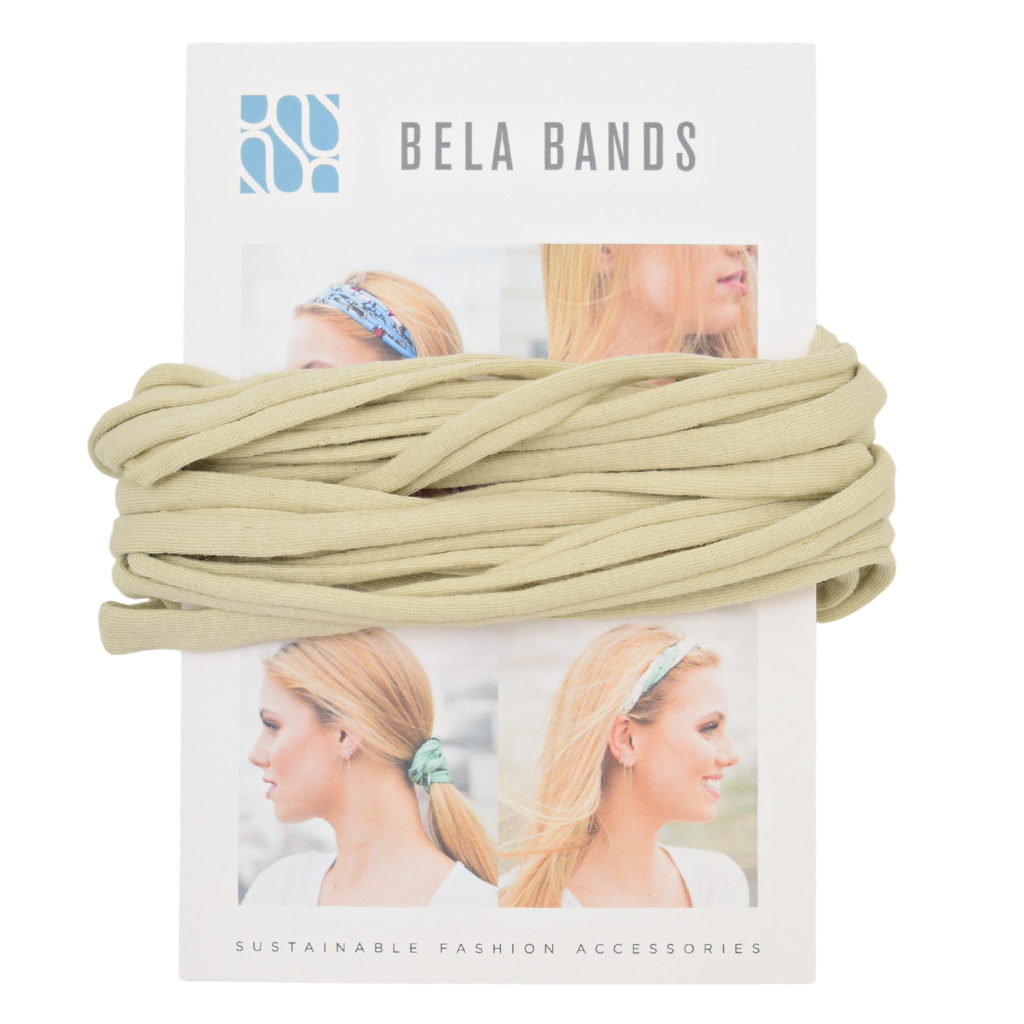 Essential Solid Bela Band Singles in various solid colors, showcasing their versatility as a headband and bracelet.
