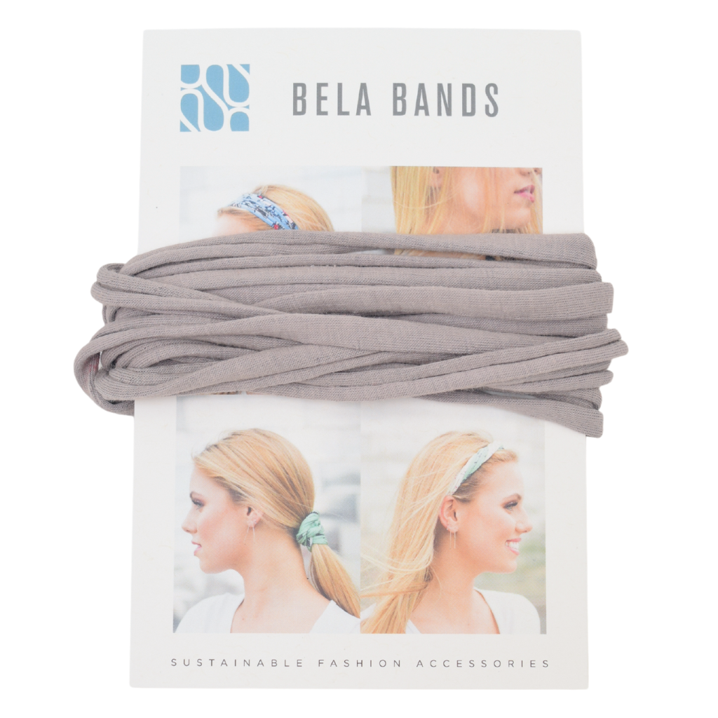 Essential Solid Bela Band Singles in various solid colors, showcasing their versatility as a headband and bracelet.
