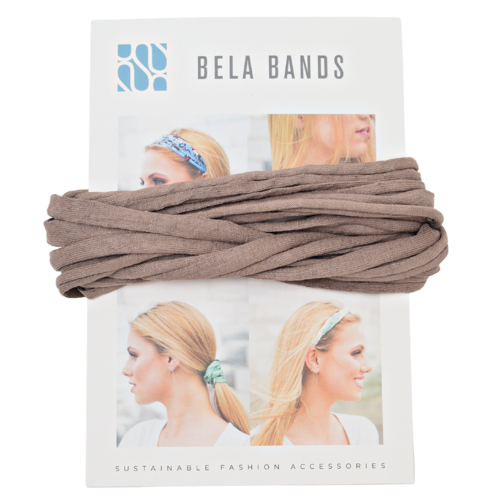 Essential Solid Bela Band Singles in various solid colors, showcasing their versatility as a headband and bracelet.