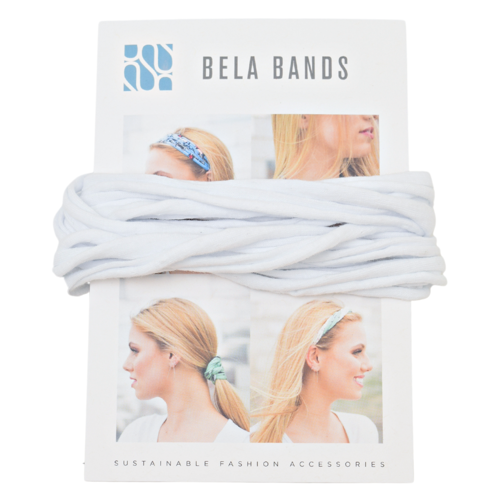 Essential Solid Bela Band Singles in various solid colors, showcasing their versatility as a headband and bracelet.
