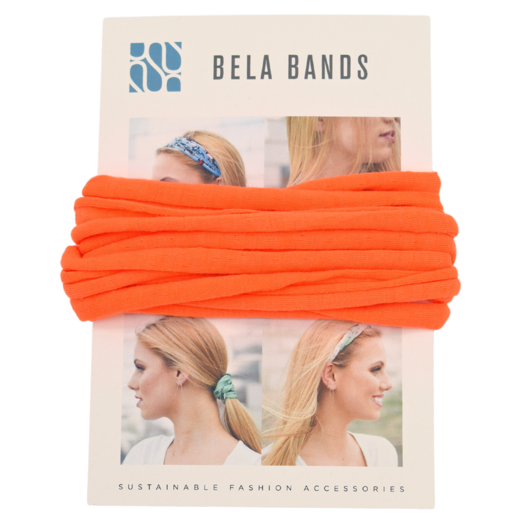 Essential Solid Bela Band Singles in various solid colors, showcasing their versatility as a headband and bracelet.
