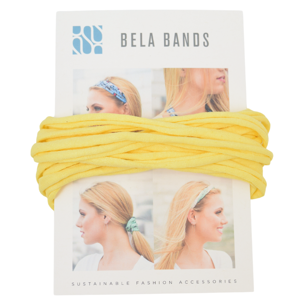 Essential Solid Bela Band Singles in various solid colors, showcasing their versatility as a headband and bracelet.