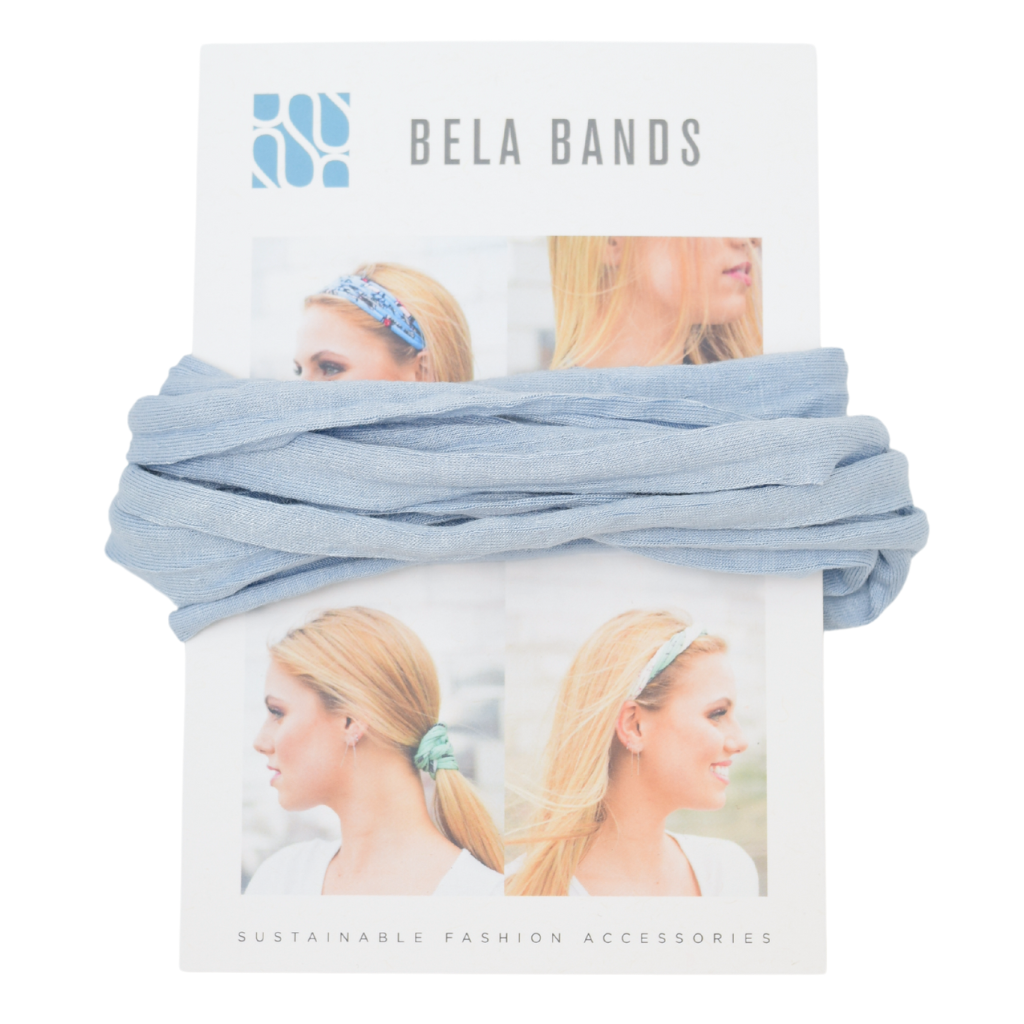 Essential Solid Bela Band Singles in various solid colors, showcasing their versatility as a headband and bracelet.