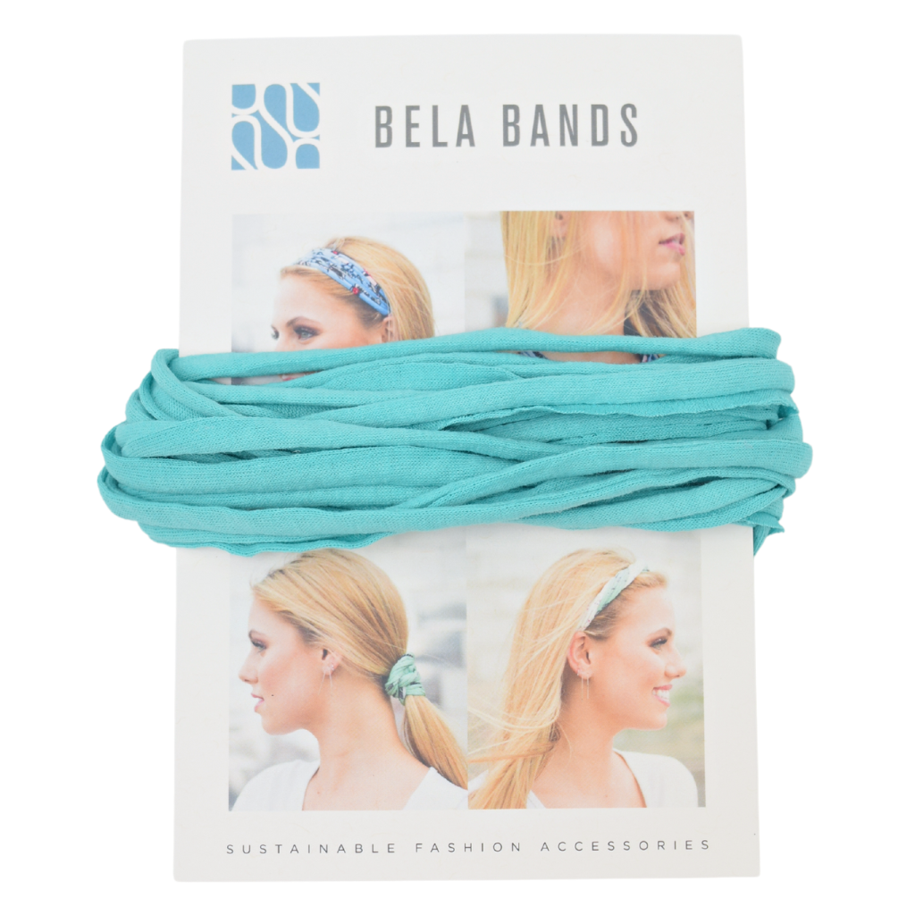 Essential Solid Bela Band Singles in various solid colors, showcasing their versatility as a headband and bracelet.