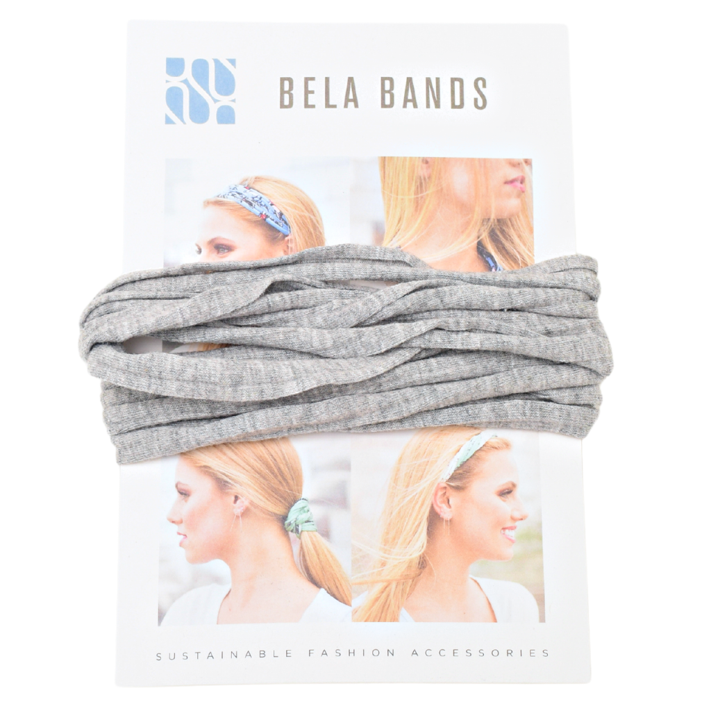 Essential Solid Bela Band Singles in various solid colors, showcasing their versatility as a headband and bracelet.