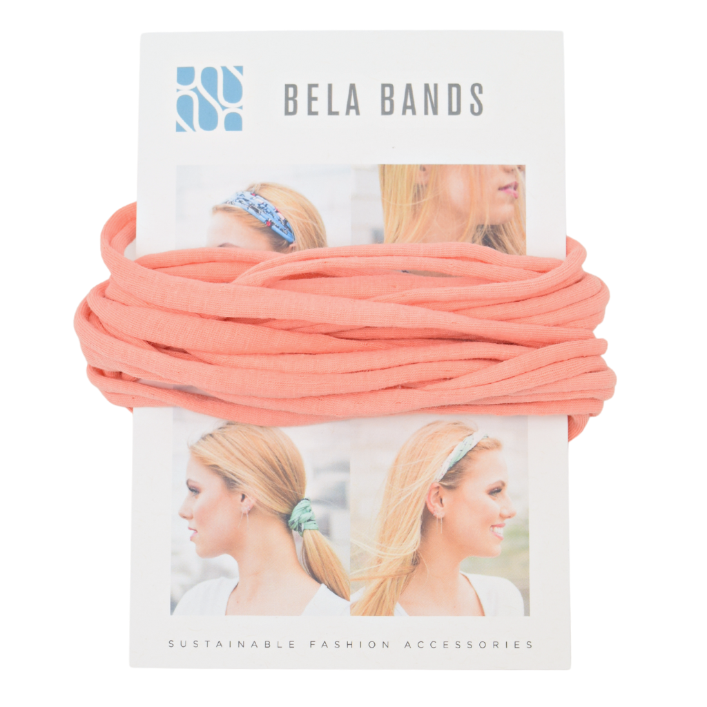 Essential Solid Bela Band Singles in various solid colors, showcasing their versatility as a headband and bracelet.