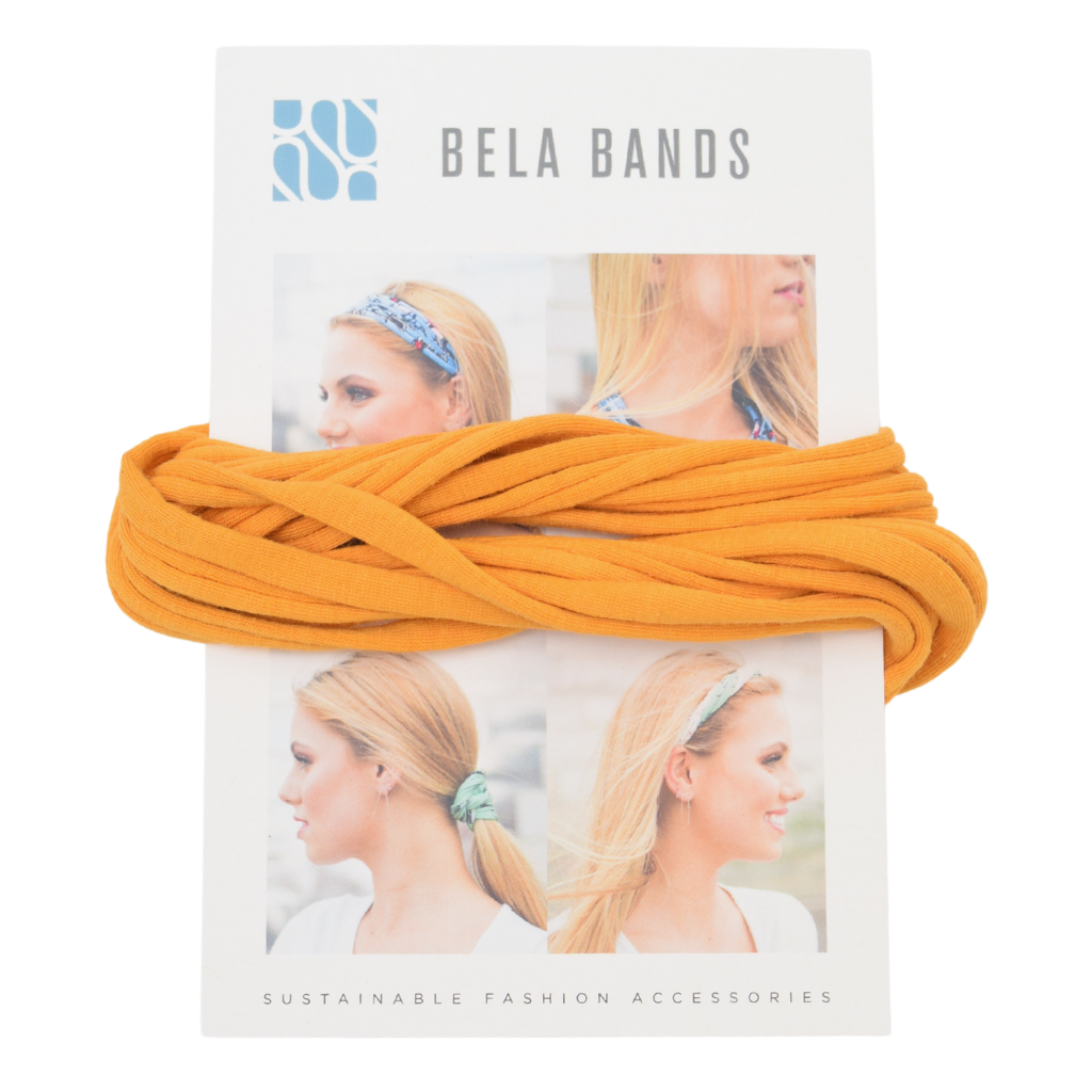 Essential Solid Bela Band Singles in various solid colors, showcasing their versatility as a headband and bracelet.