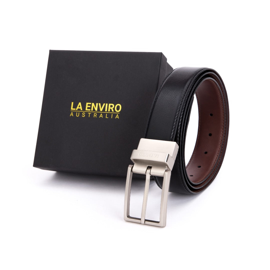 EZRA Reversible Belt in classic black and brown vegan leather with antique silver buckle.