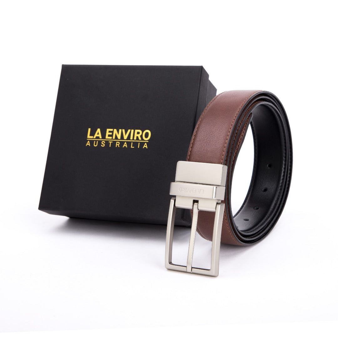 EZRA Reversible Belt in classic black and brown vegan leather with antique silver buckle.