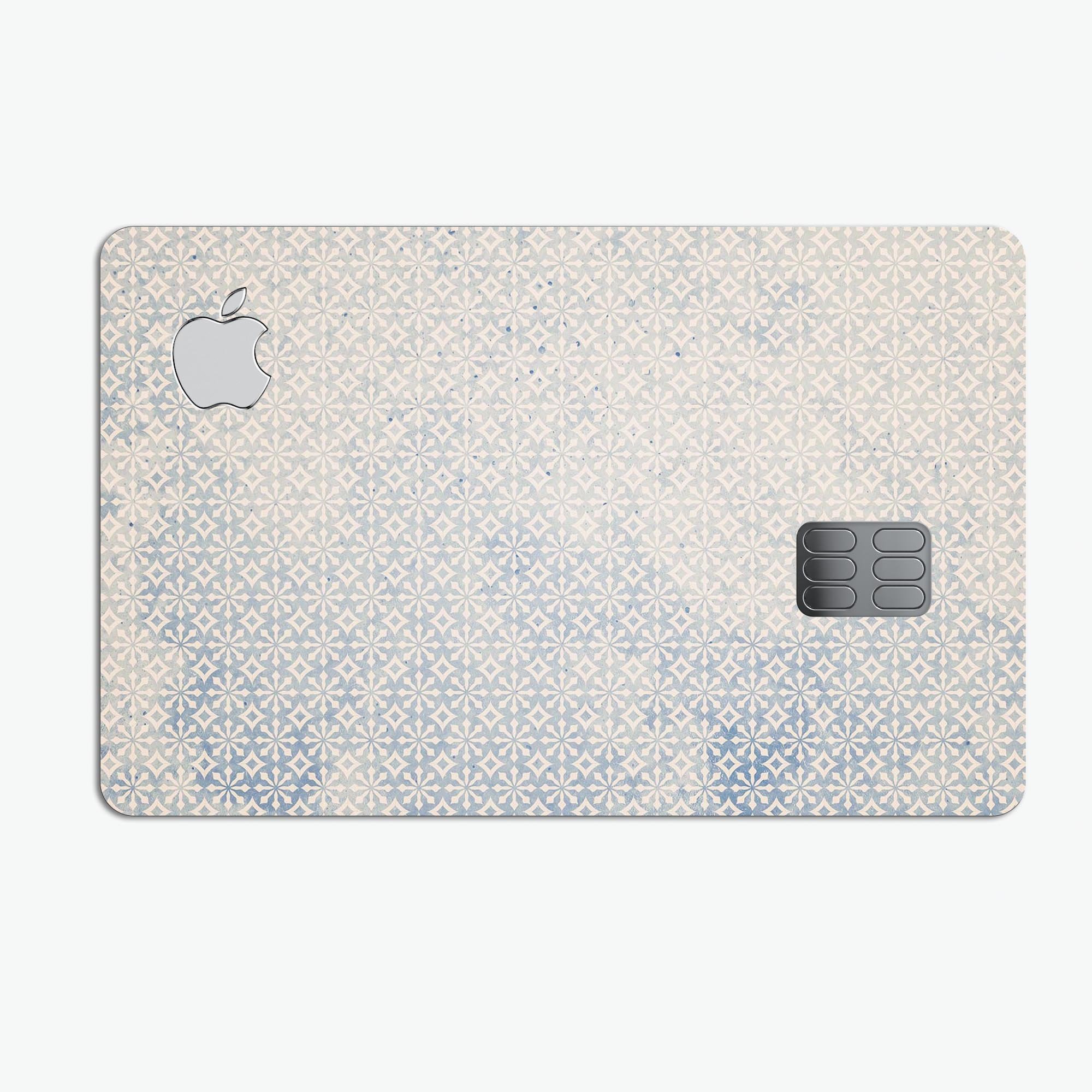 Faded blue and white snowflake pattern protective decal for Apple Card, showcasing a stylish design and premium quality.