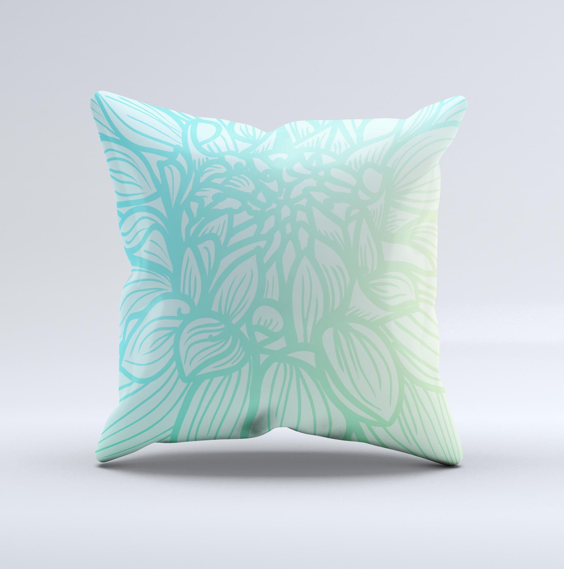 Faded blue green decorative throw pillow with subtle floral design, showcasing unique handmade craftsmanship and high-quality fabric.