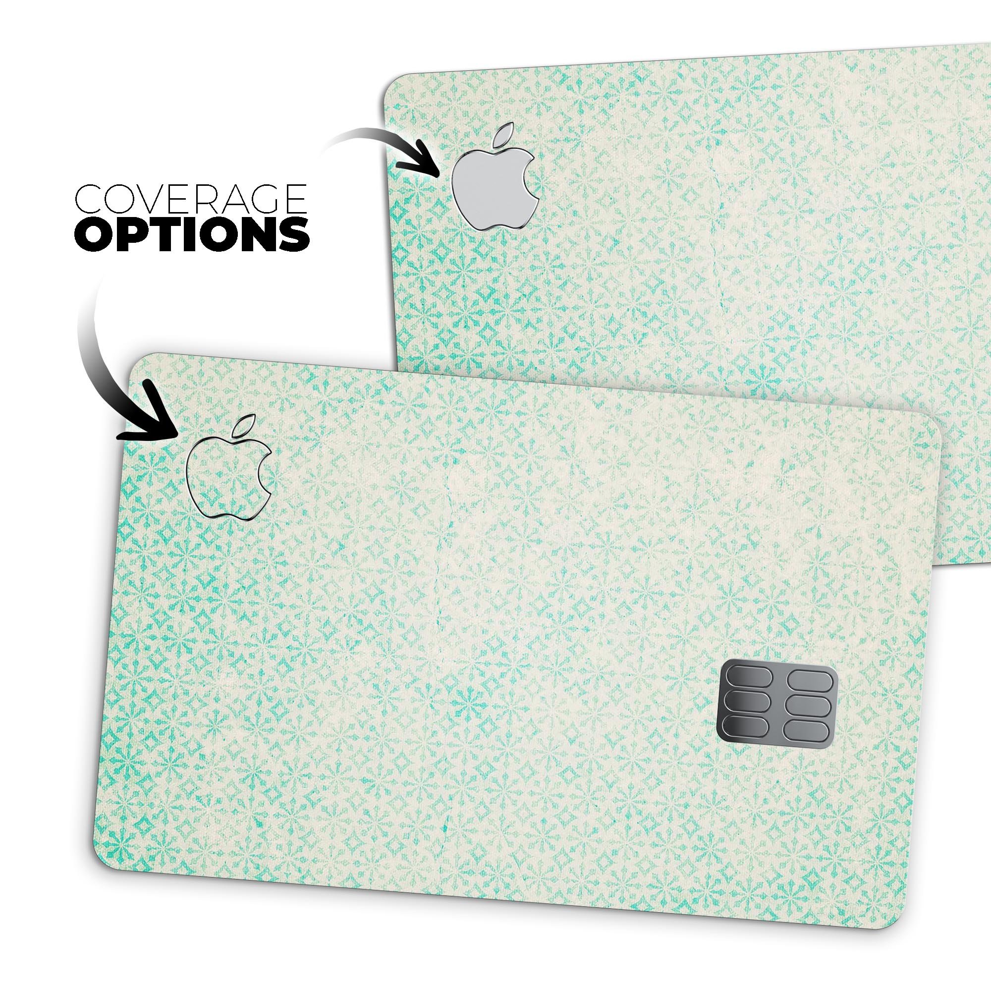 Faded teal snowflake pattern protective decal skin for Apple Card, showcasing its vibrant design and premium quality.