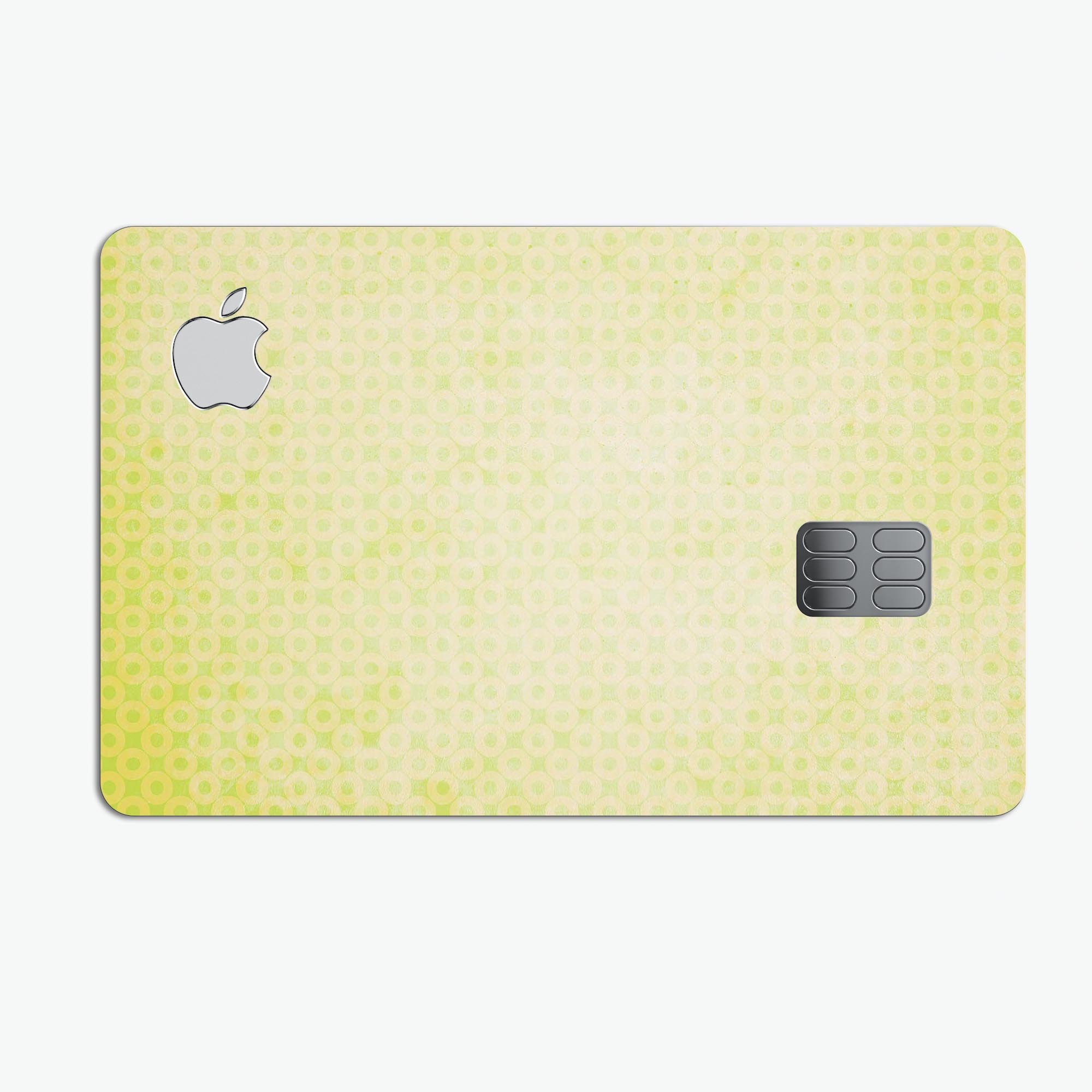 Faded Yellow Micro Grunge Dots skin applied on an Apple Card, showcasing a stylish and protective design.