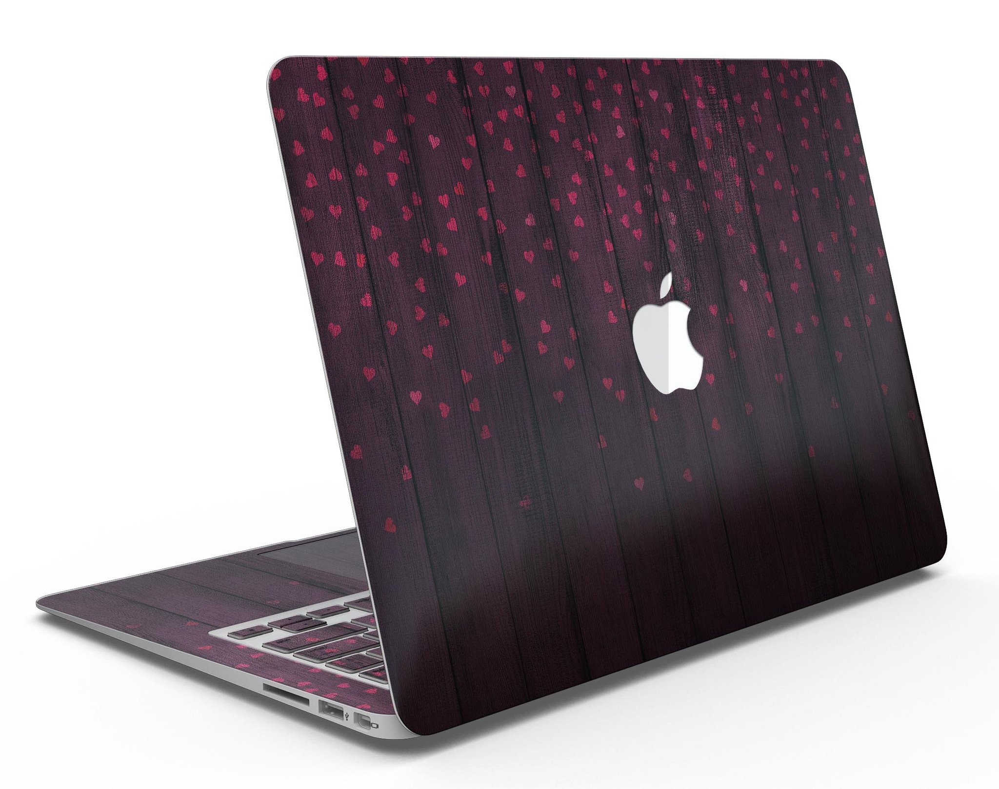 Falling Micro Hearts design on burgundy wood planks MacBook Air skin, showcasing vibrant colors and premium vinyl material.